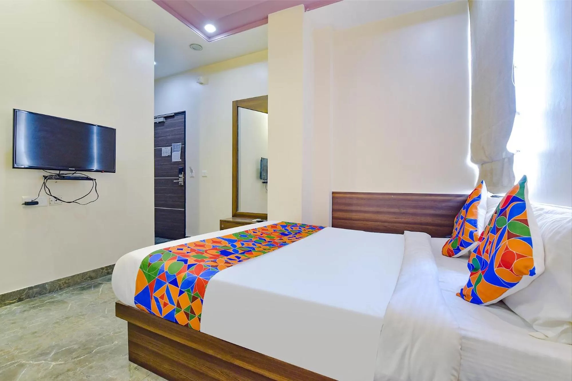 Bed in FabHotel Resolute Gopalpura