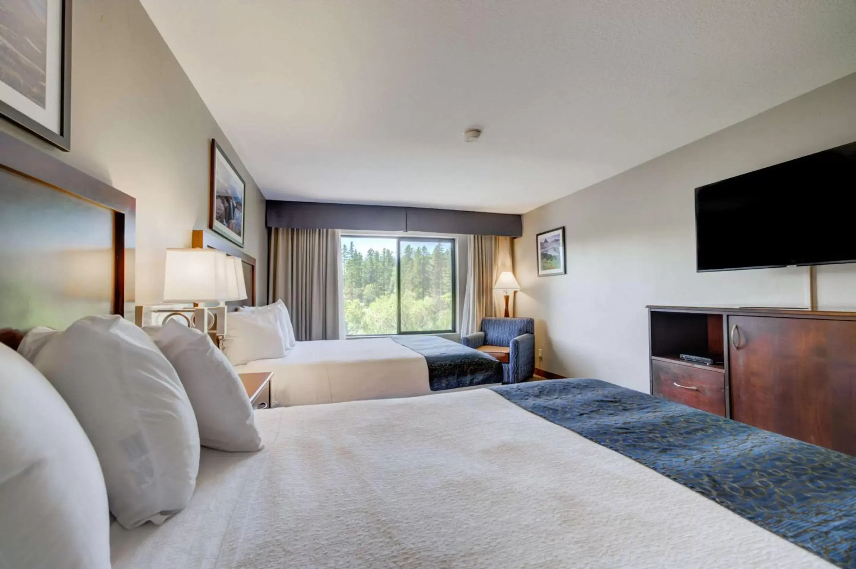 Bedroom in The Pine Lodge on Whitefish River, Ascend Hotel Collection