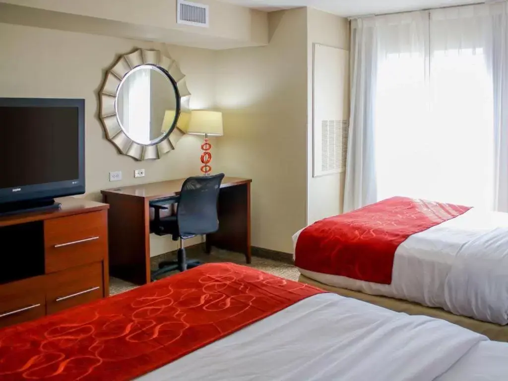 Bed in Comfort Suites at Virginia Center Commons