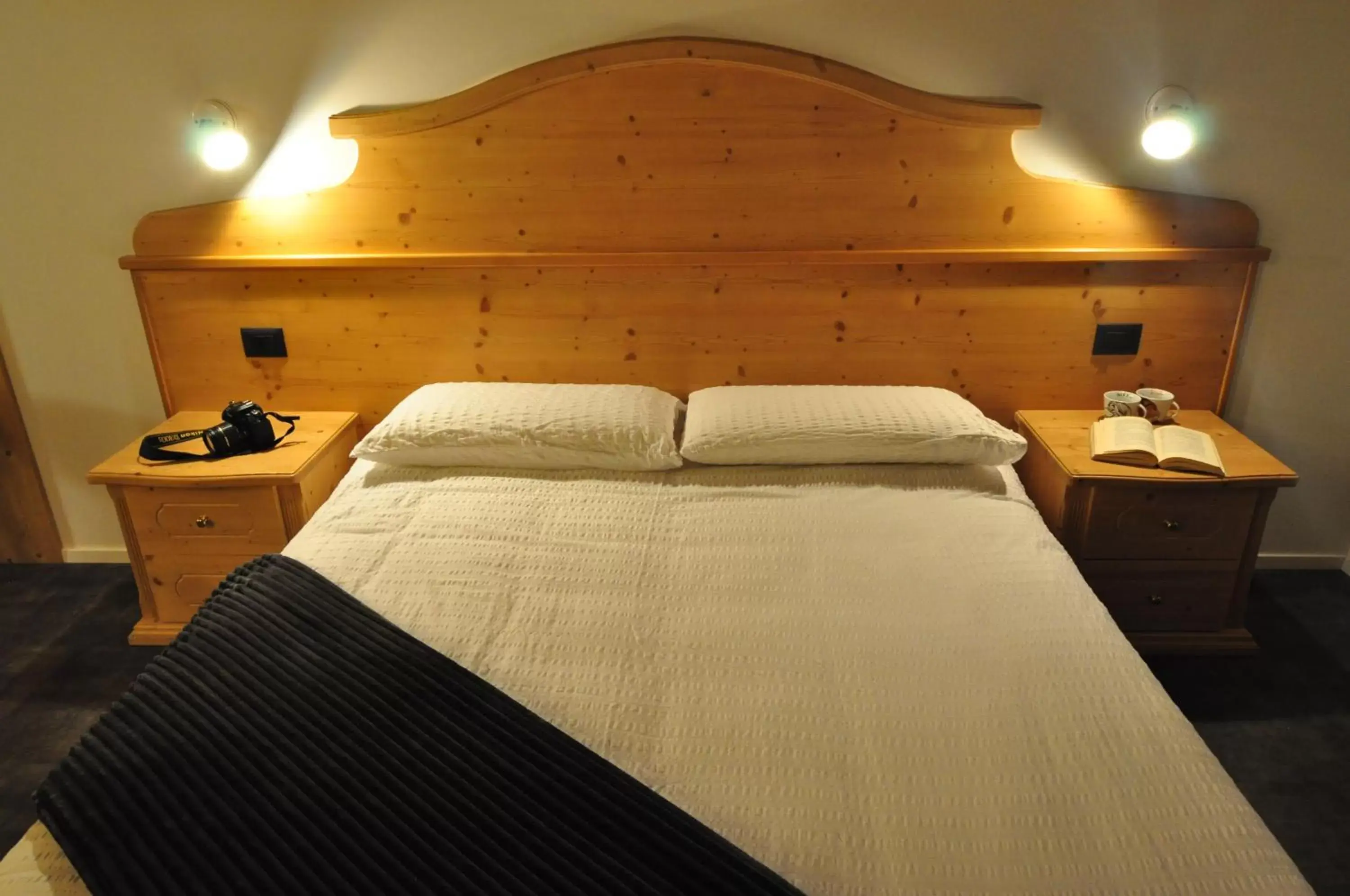 Bed in Albergo Alpino