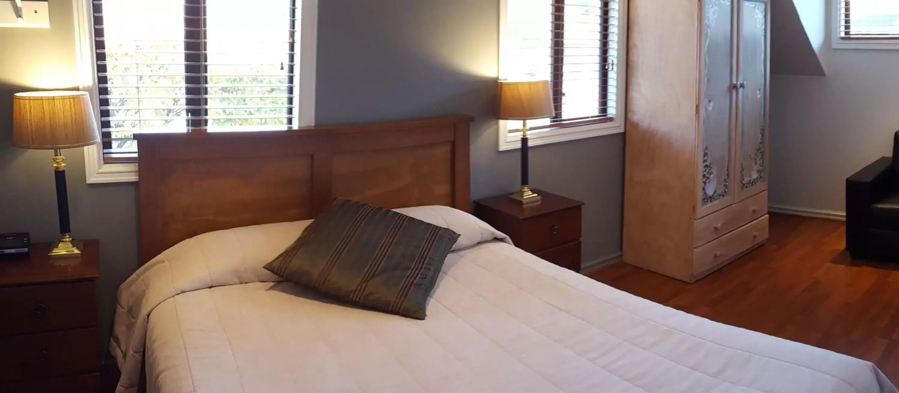 Bed in Wanaka Luxury Apartments