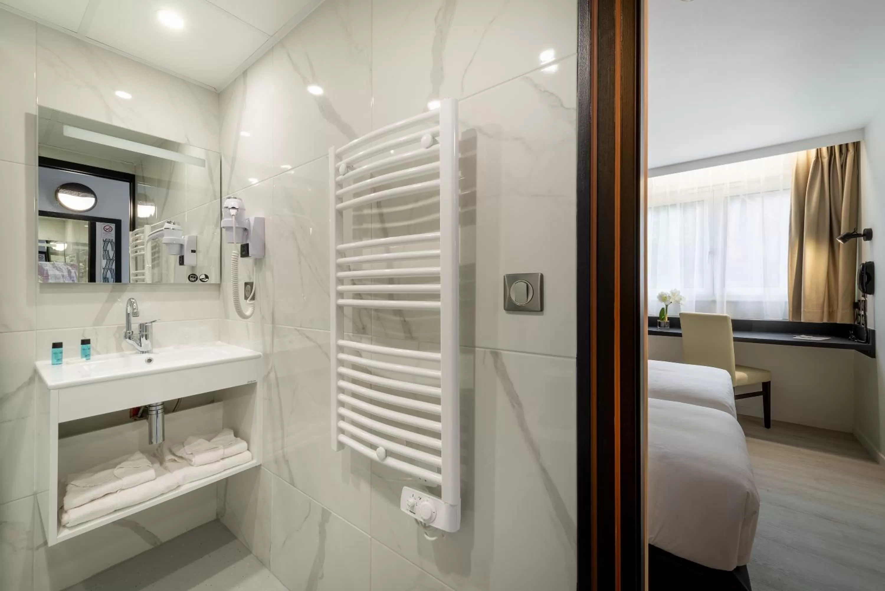 Photo of the whole room, Bed in Zenith Hotel Caen