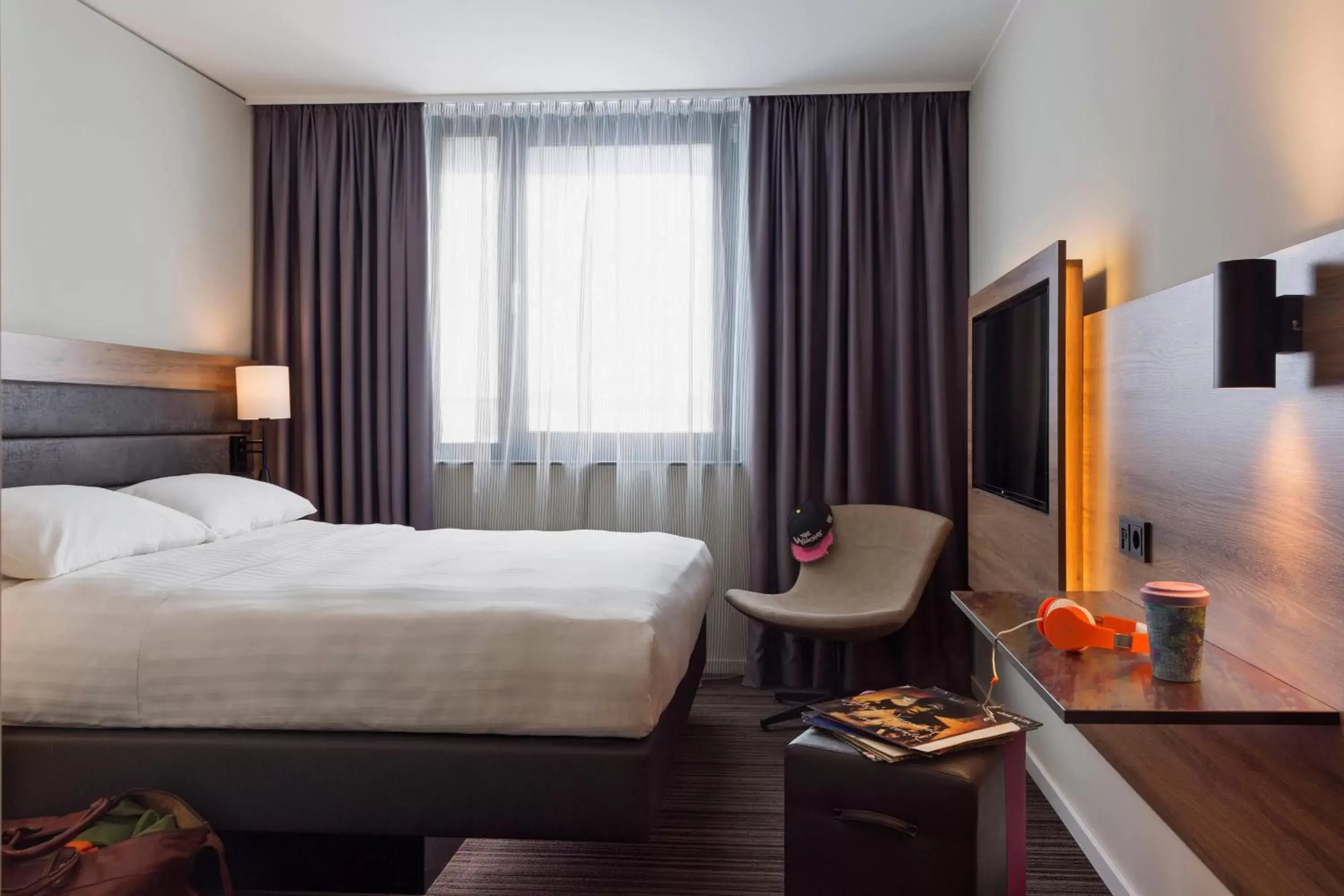 Photo of the whole room, Bed in Moxy by Marriott Stuttgart Airport/Messe