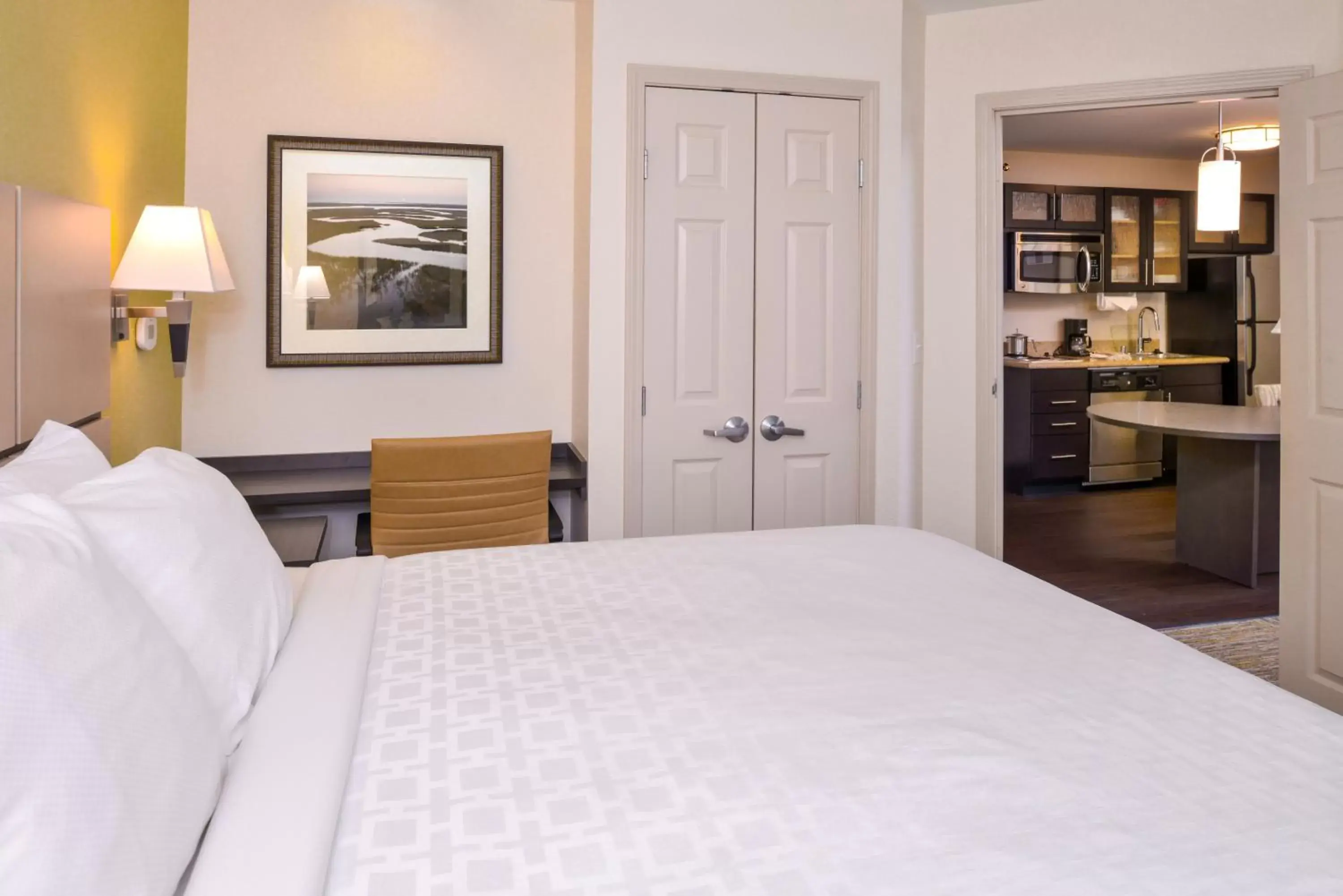 Bed in Candlewood Suites - Plano North, an IHG Hotel