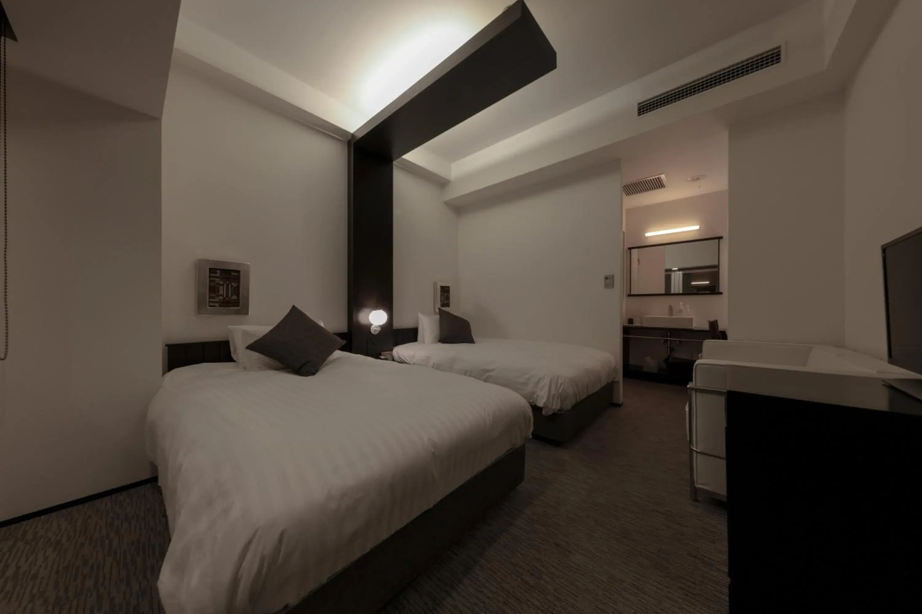 Bed in Furano Natulux Hotel