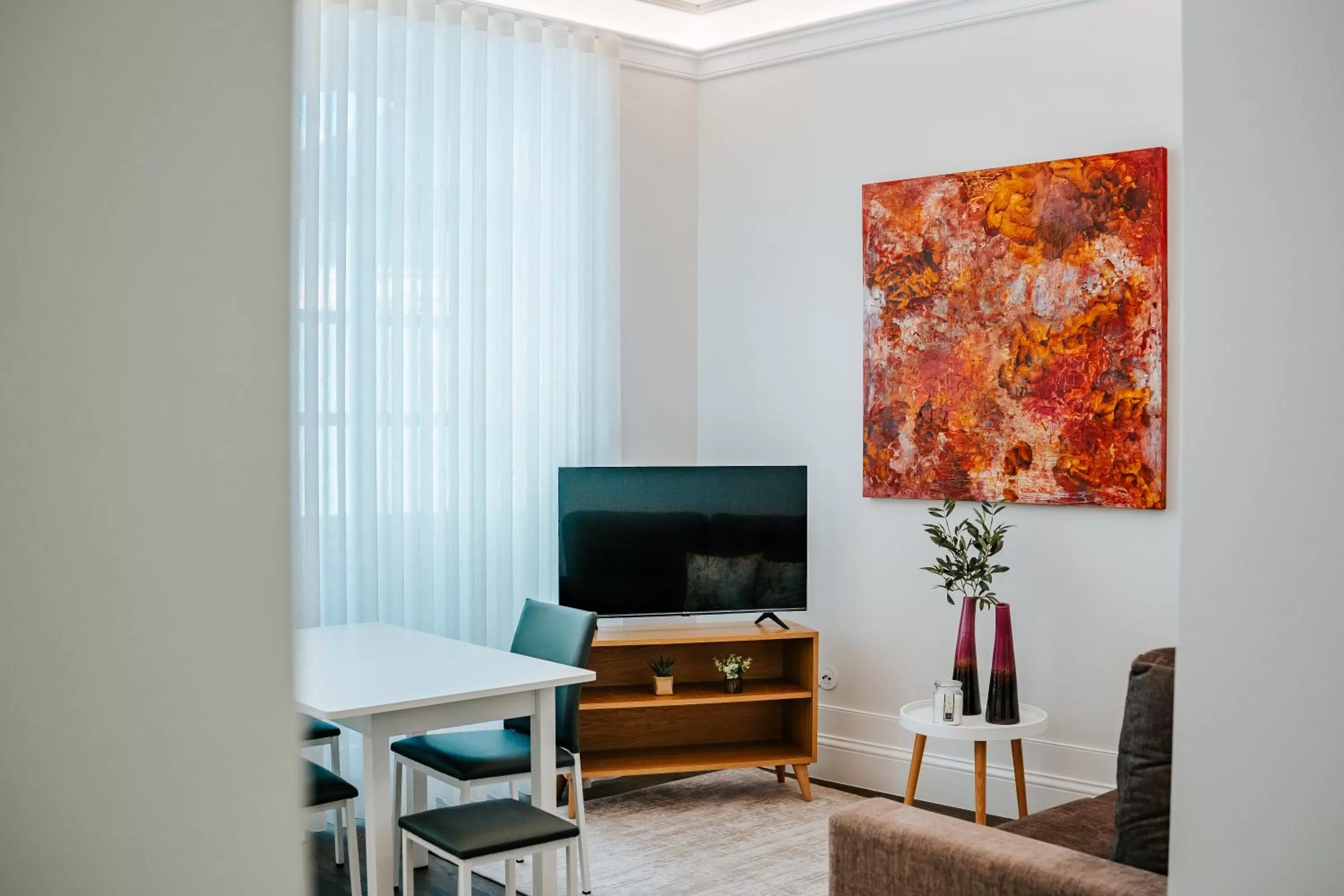 Communal lounge/ TV room in Casa Guerreiro - Regina Hotel Group