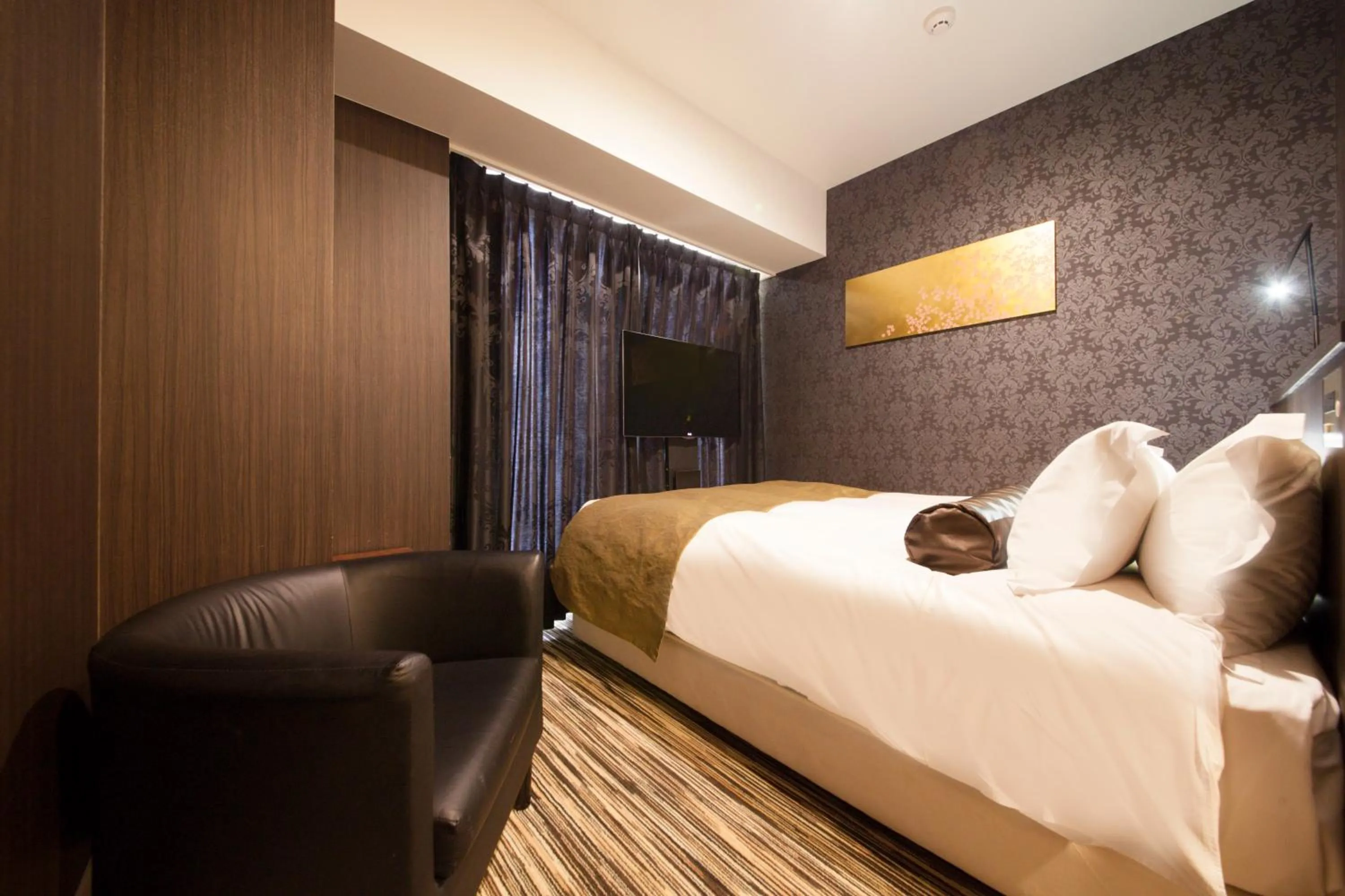 Photo of the whole room, Bed in Centurion Hotel Grand Akasakamitsuke Station