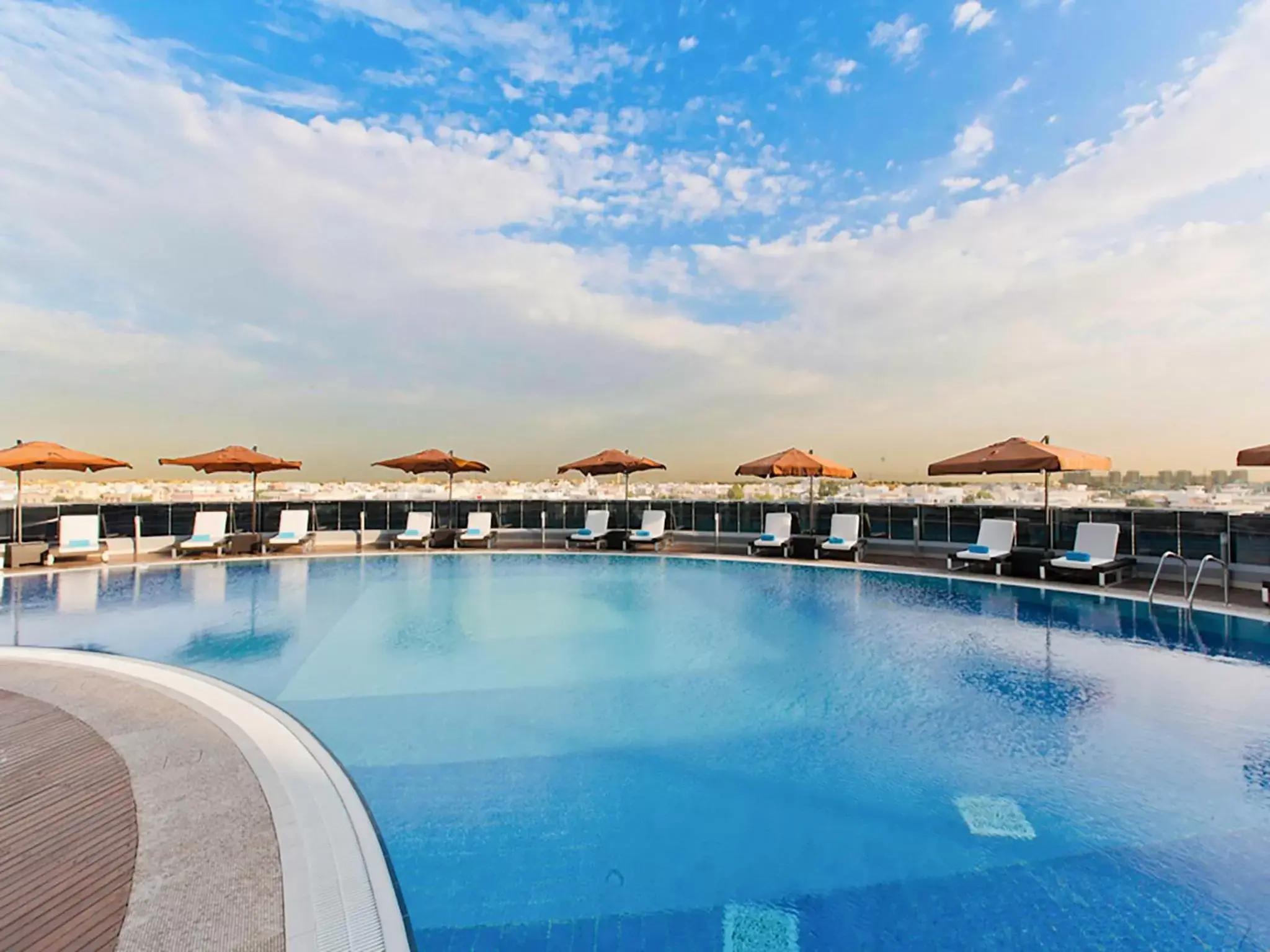Area and facilities, Swimming Pool in Novotel Abu Dhabi Gate