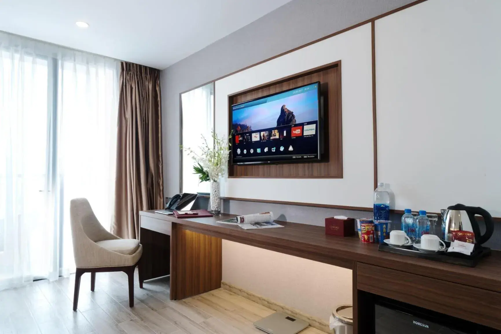 TV and multimedia, TV/Entertainment Center in Le More Hotel