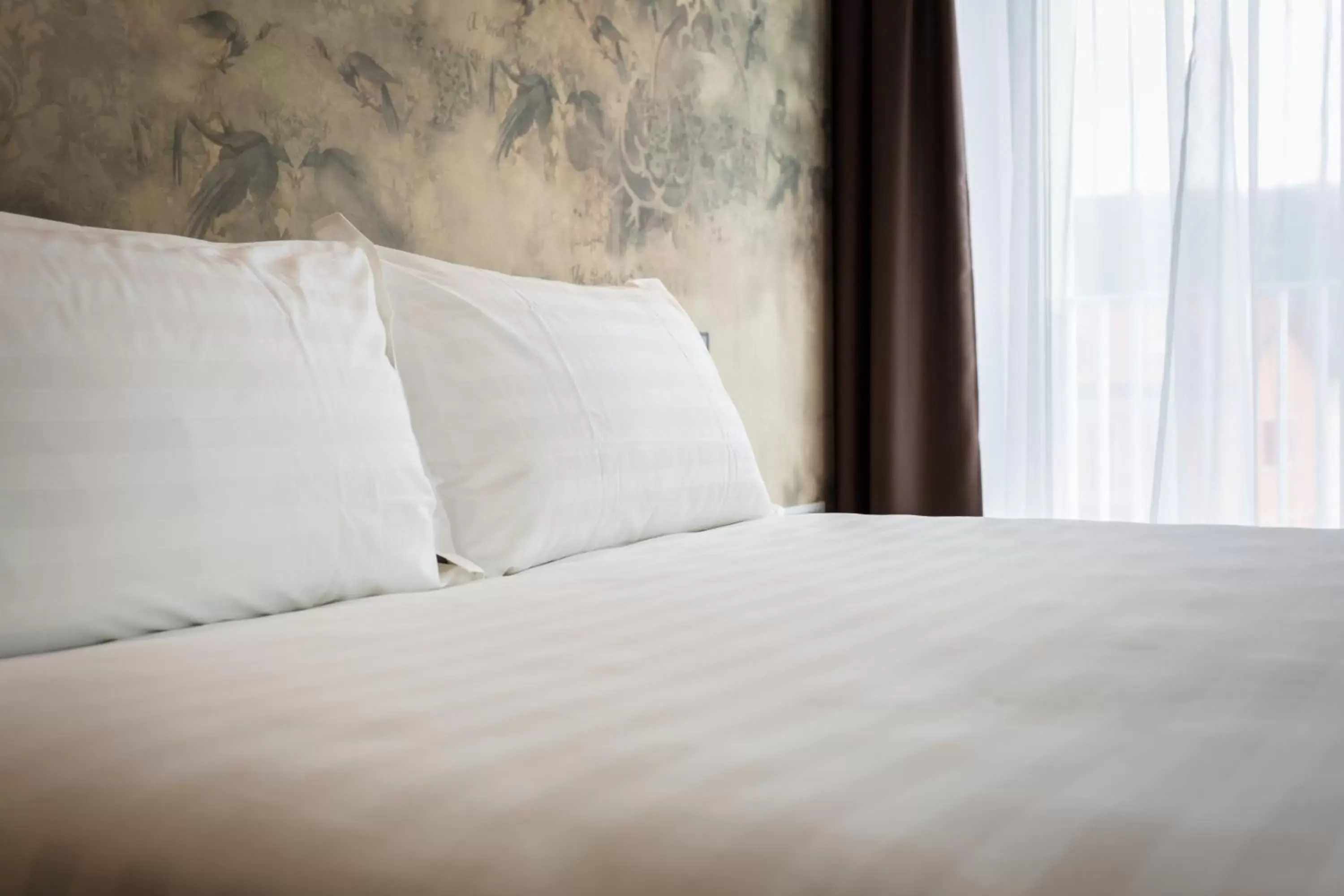 Bed in Suites Hotel Astor