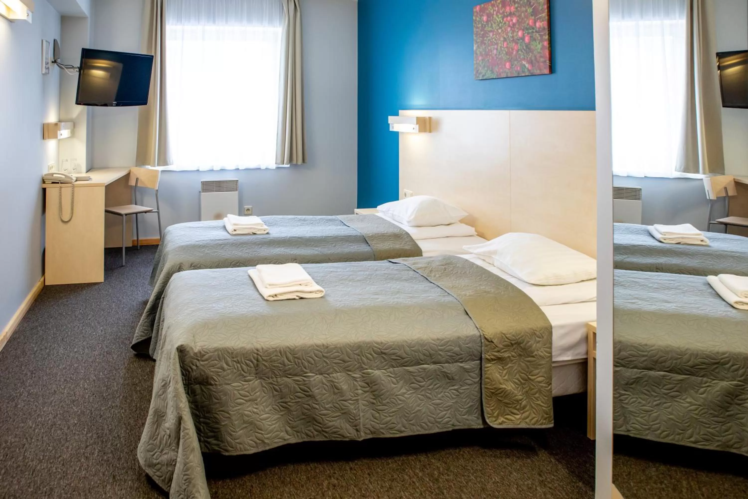 Bed in Rija Bauska Hotel