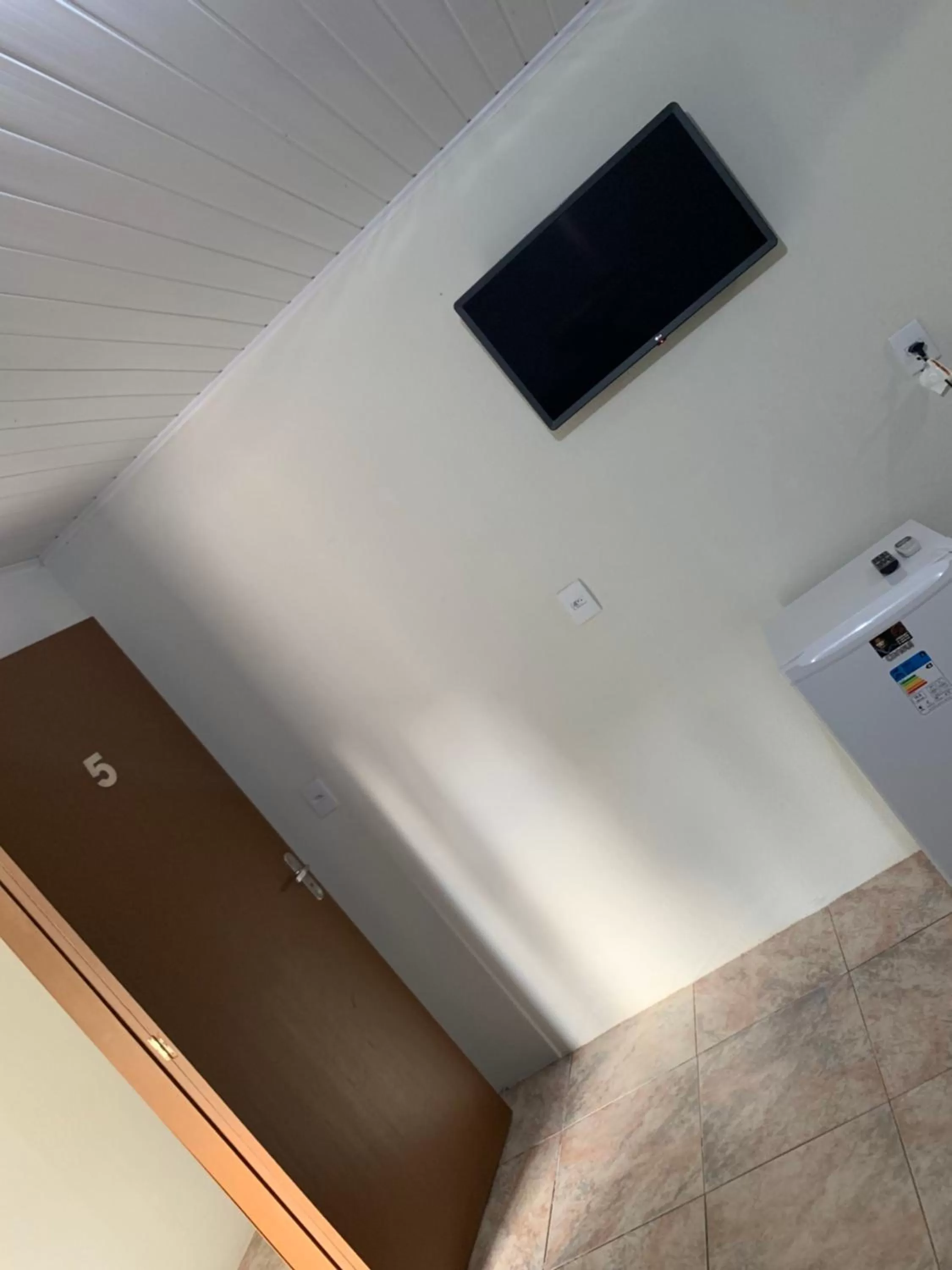 TV and multimedia, TV/Entertainment Center in Pousada Tio Tonho