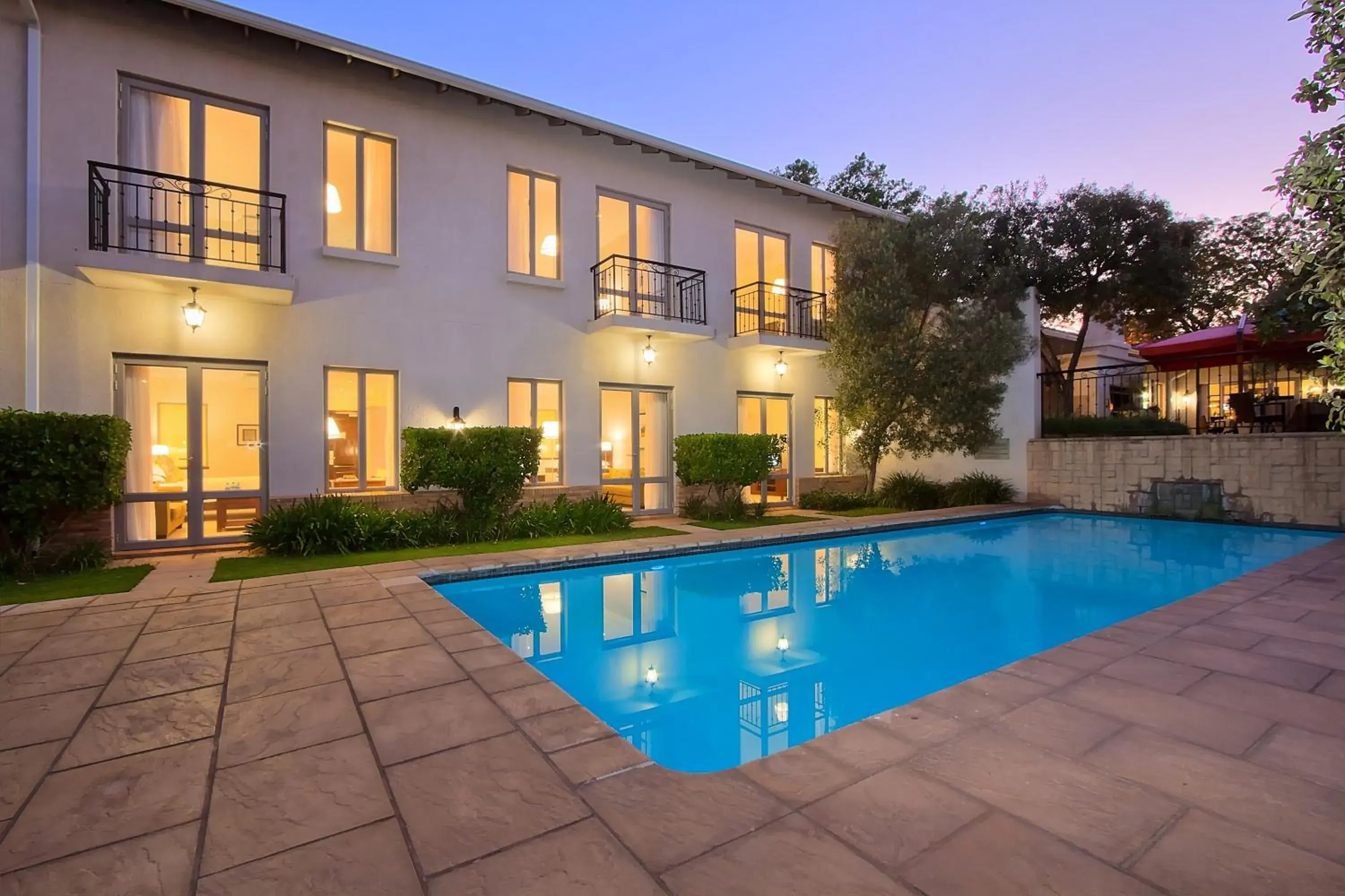 Swimming pool, Property Building in The Syrene Boutique Hotel