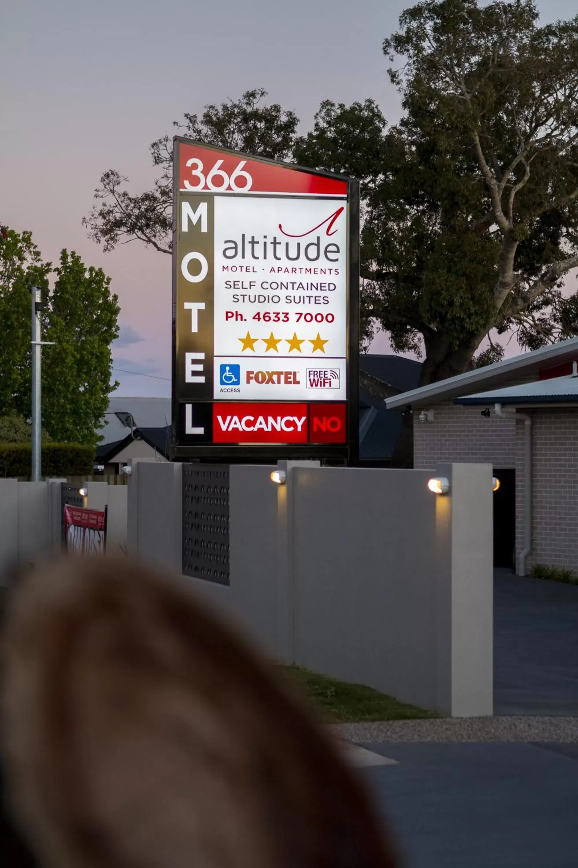 Property logo or sign in Altitude Motel Apartments