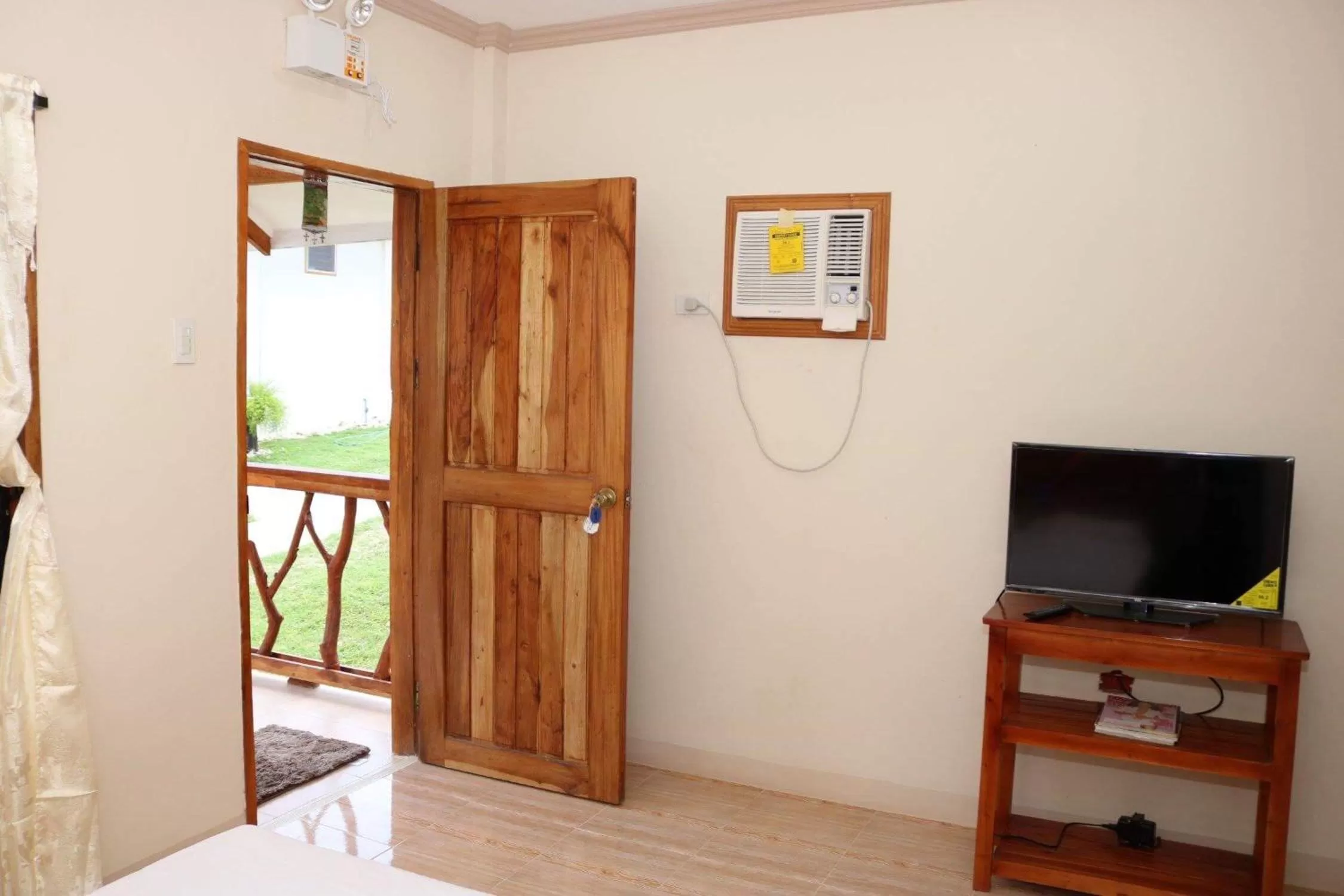 TV and multimedia in D's Oceanview Beach Resort