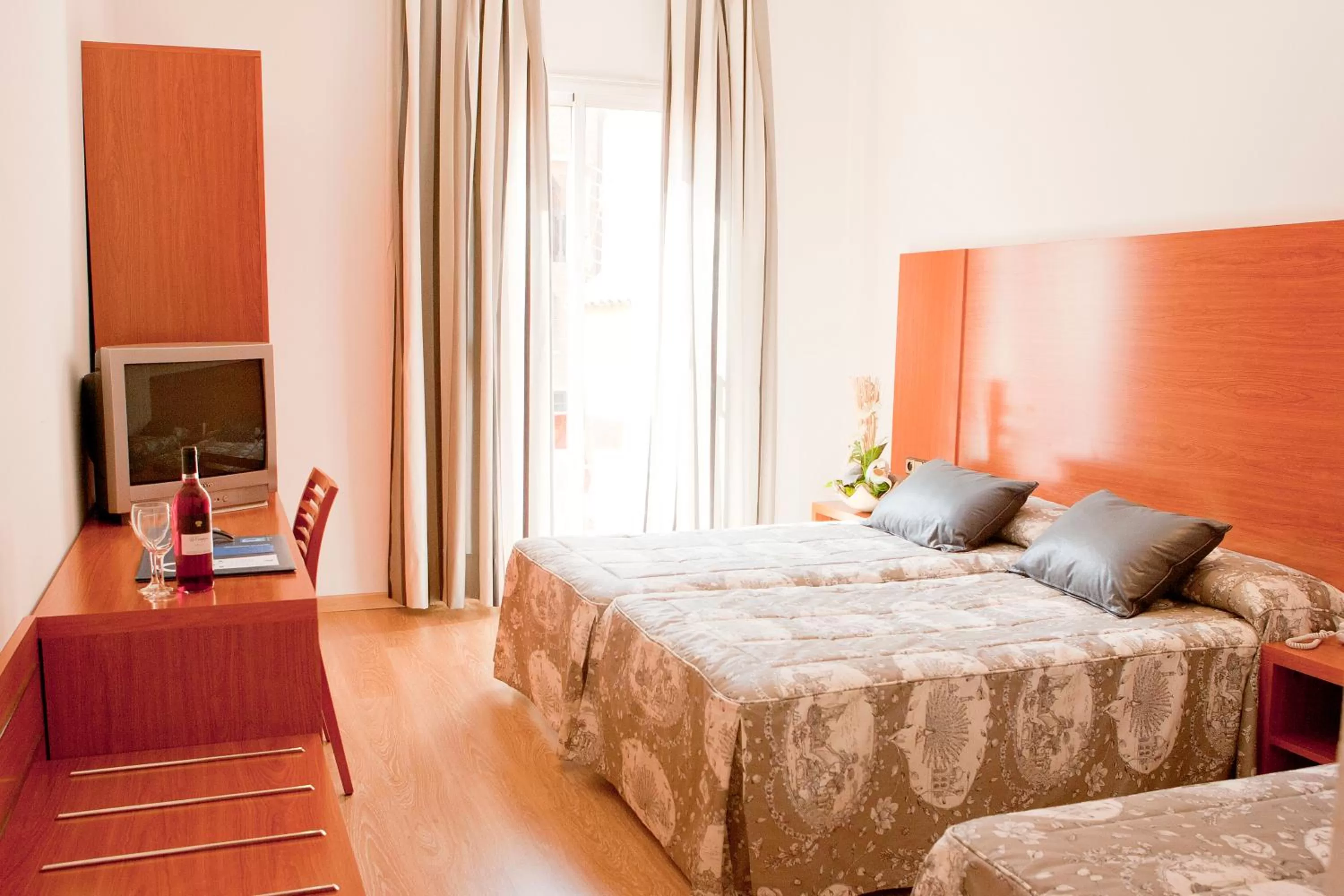 Bed in Ramblas Hotel