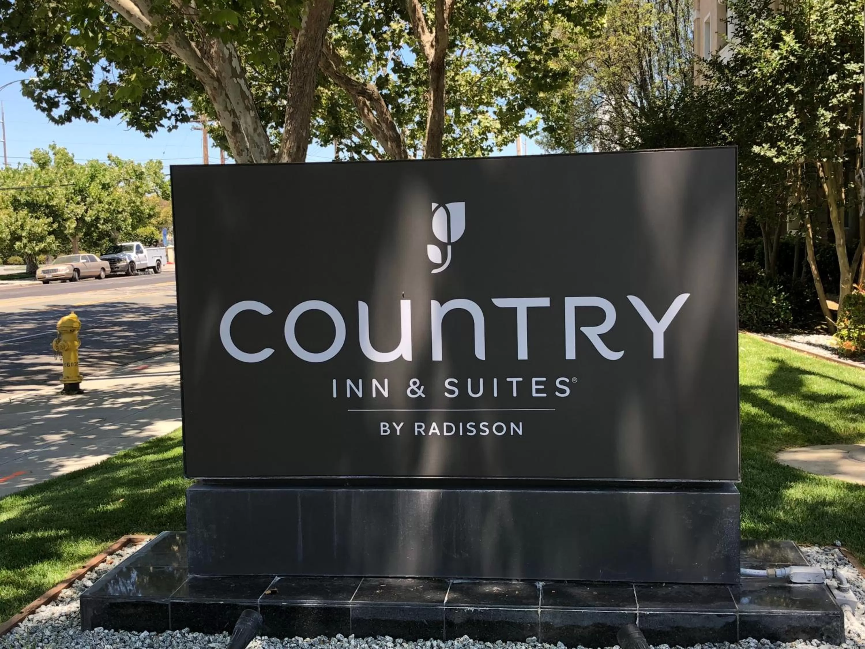 Property logo or sign in Country Inn & Suites by Radisson, San Jose International Airport, CA