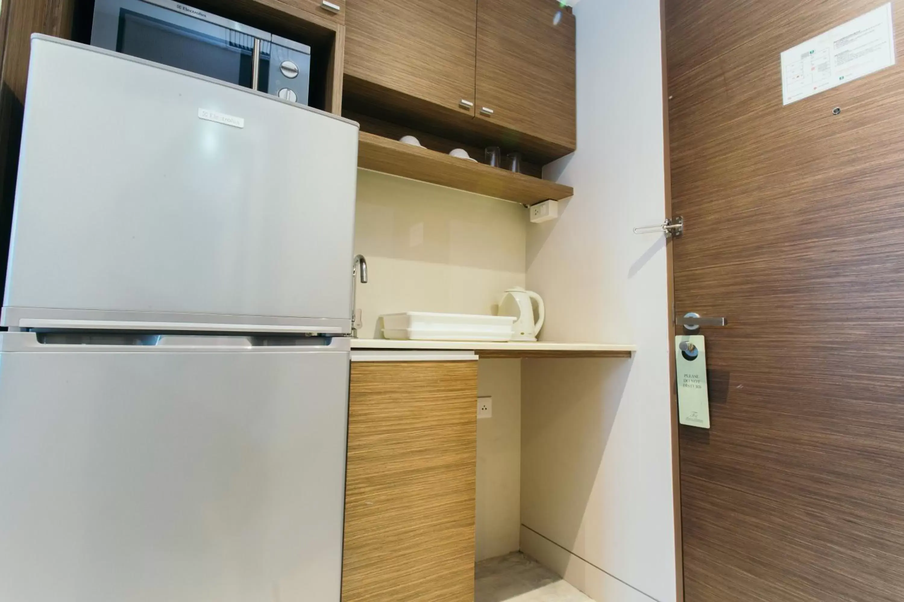 Kitchen or kitchenette in Thomson Residence Hotel