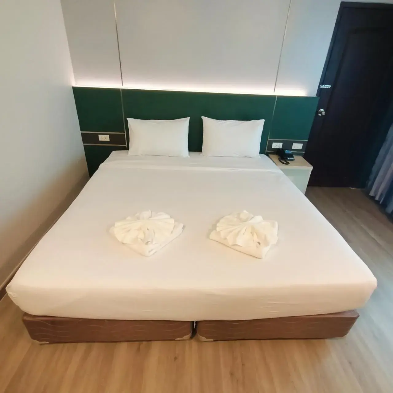 Bed in Mayflower Grande Hotel Phitsanulok