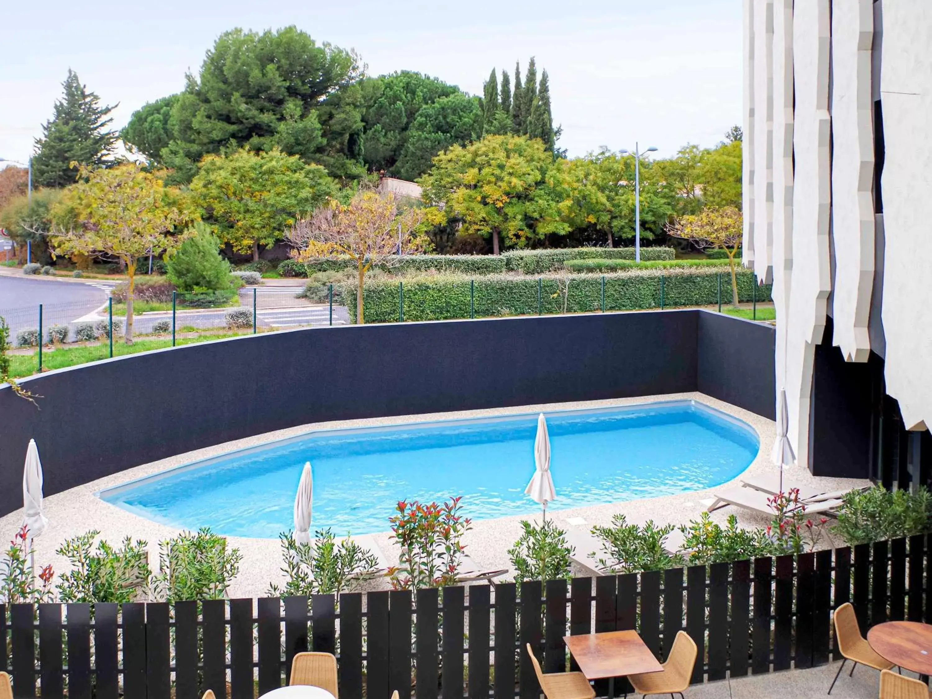 Property building, Pool View in Ibis Lunel Petite Camargue