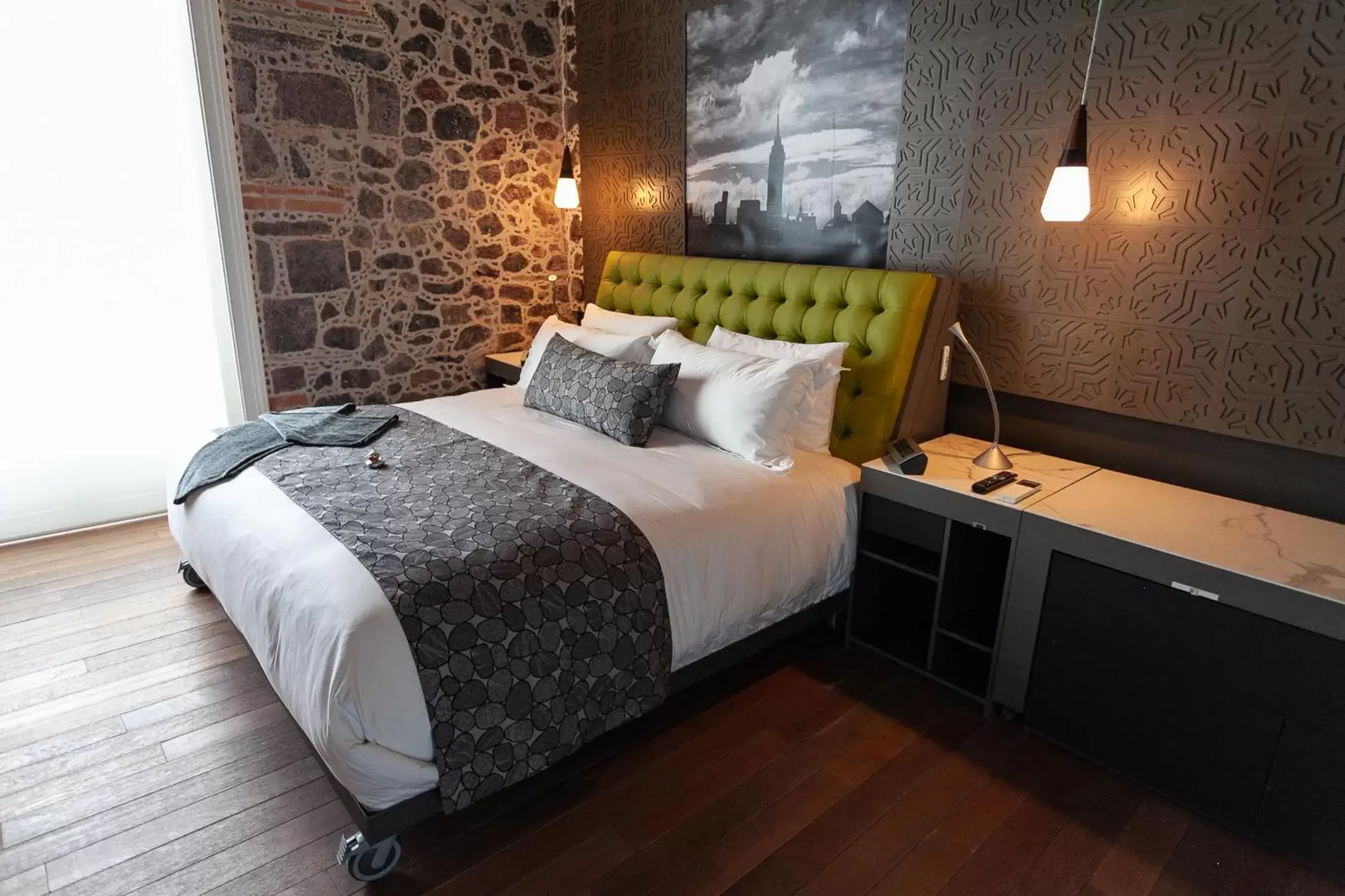 Bed in Mumedi Design Hotel