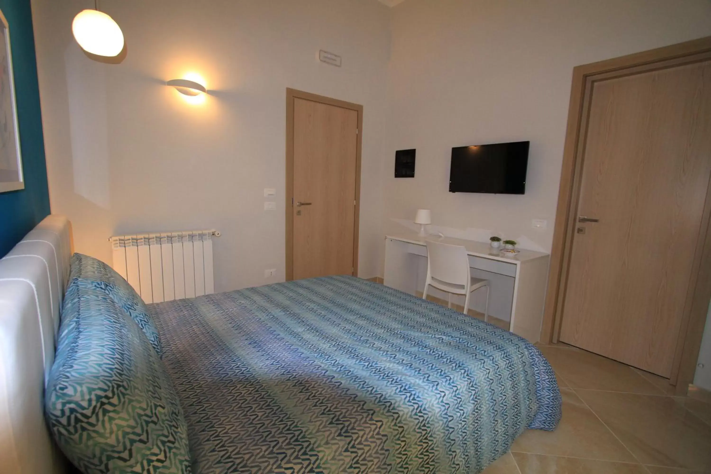Photo of the whole room, Bed in La Passeggiata di Girgenti