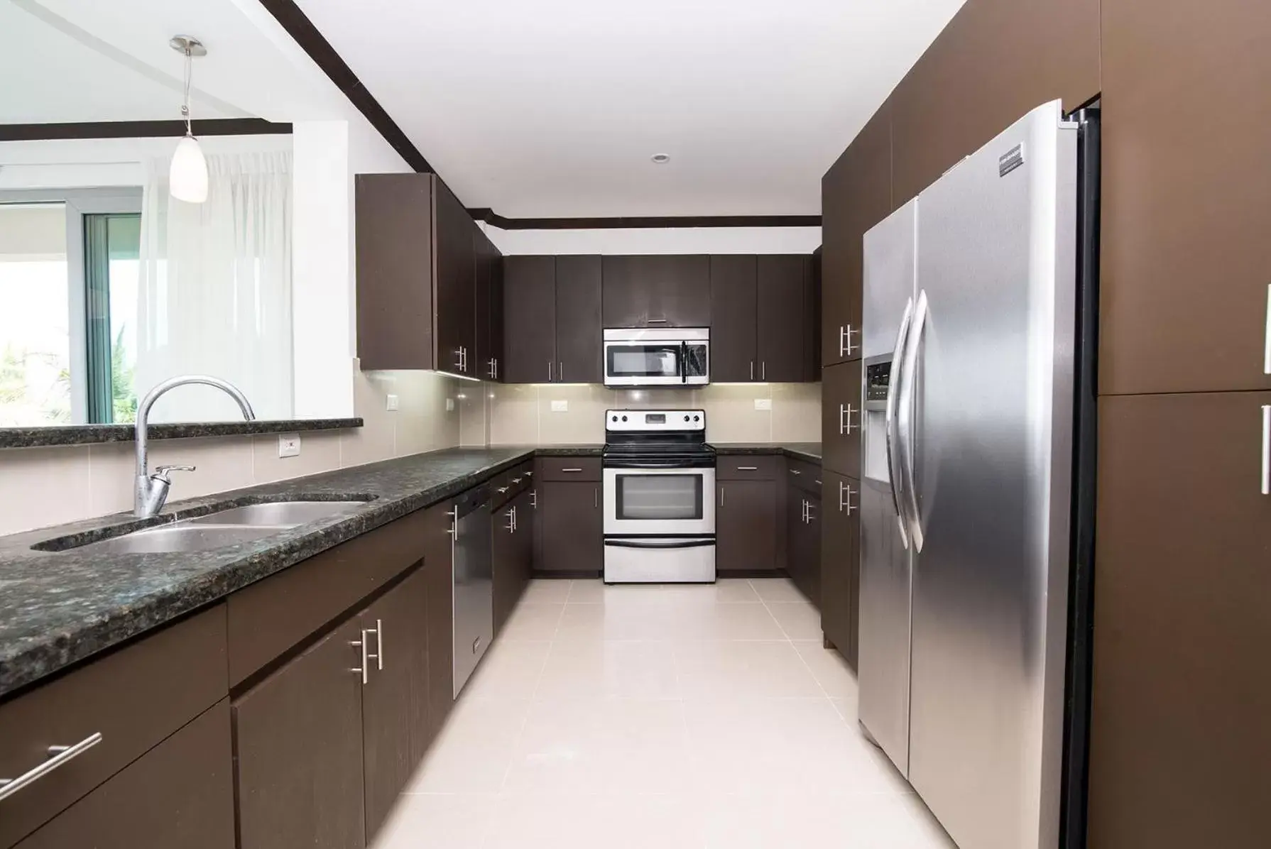 Kitchen/Kitchenette in Best in Jaco Condos at Diamante del Sol