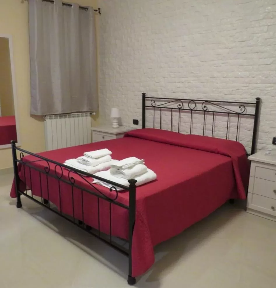 Bed in B&B Romano