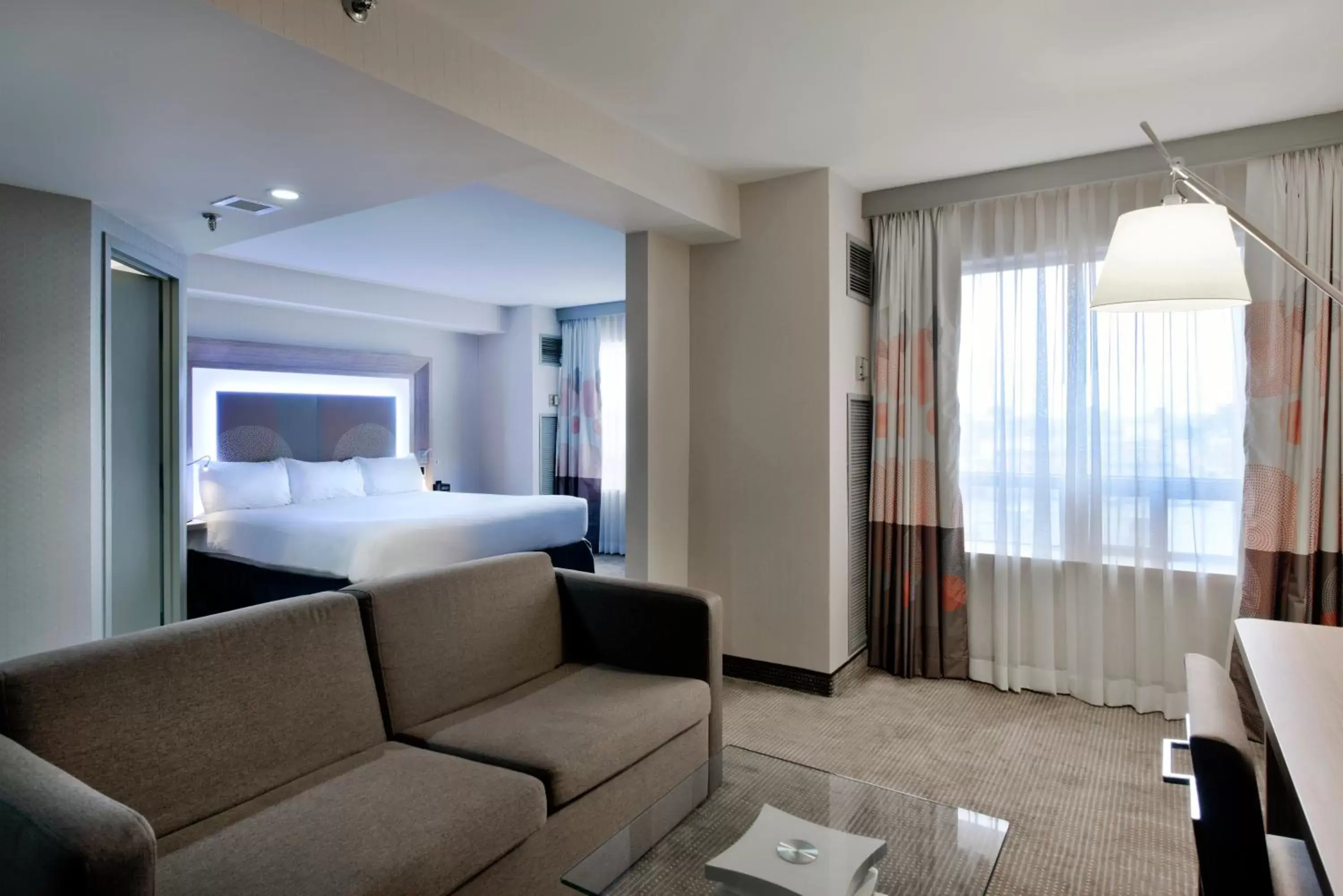 Bed, Seating Area in Novotel Ottawa City Centre Hotel