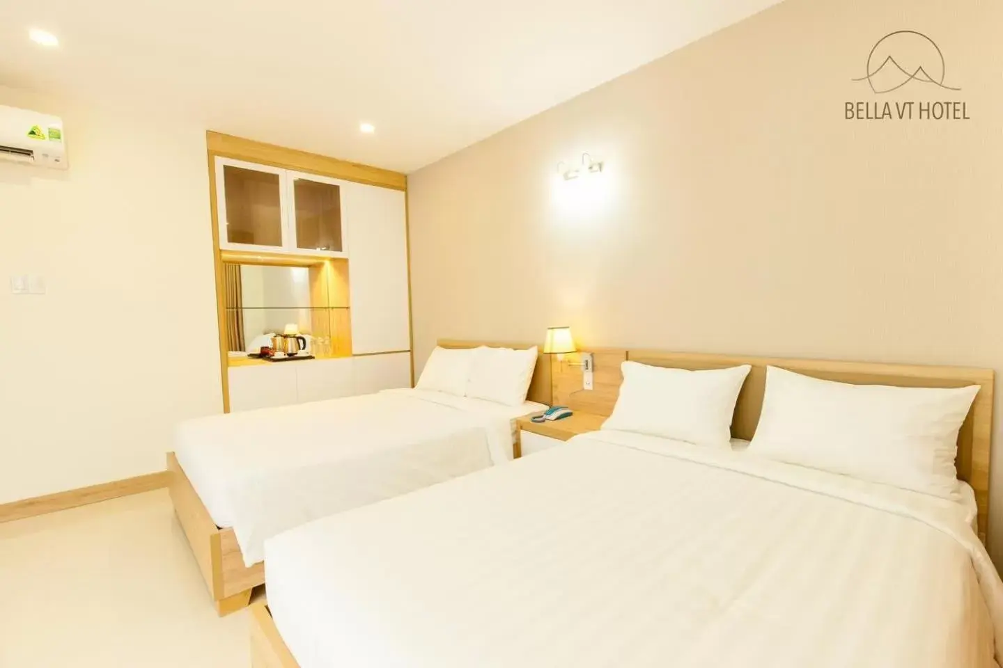 Bed in BELLA VT HOTEL