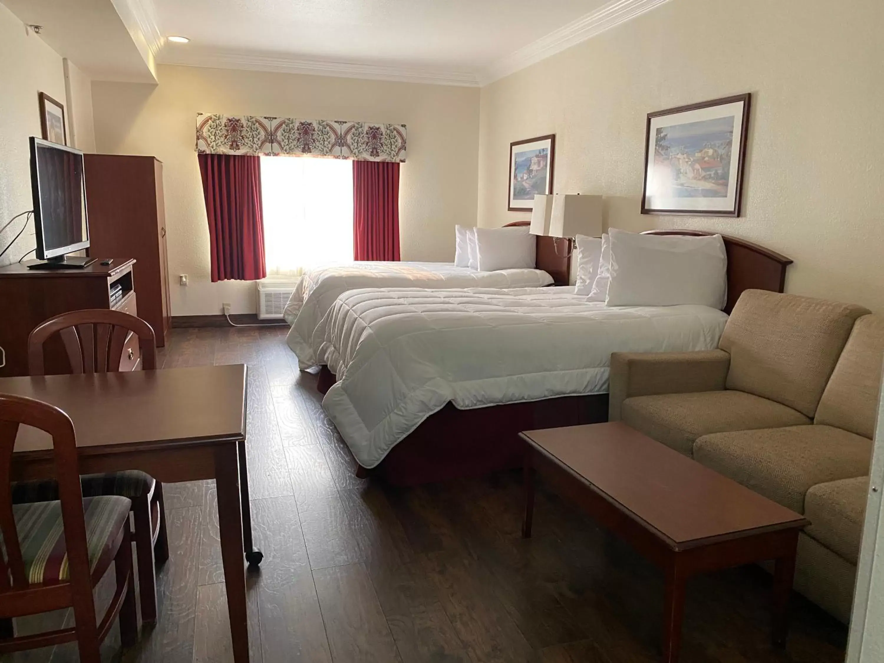 Bed in Homestead Lodge Apart Hotel Bed in Homestead Lodge Apart Hotel