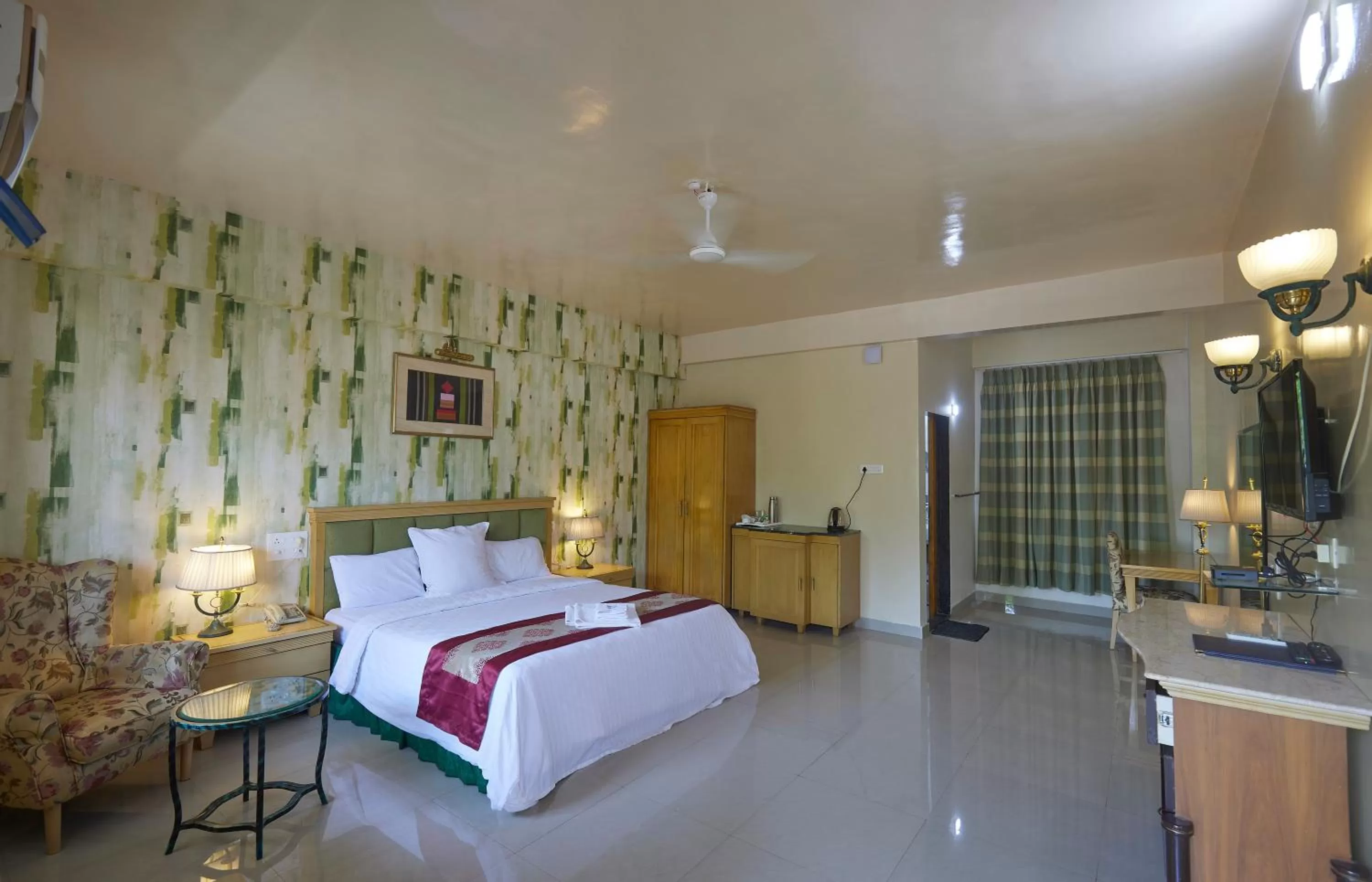 Bed in Mango Valley Resort Ganpatipule