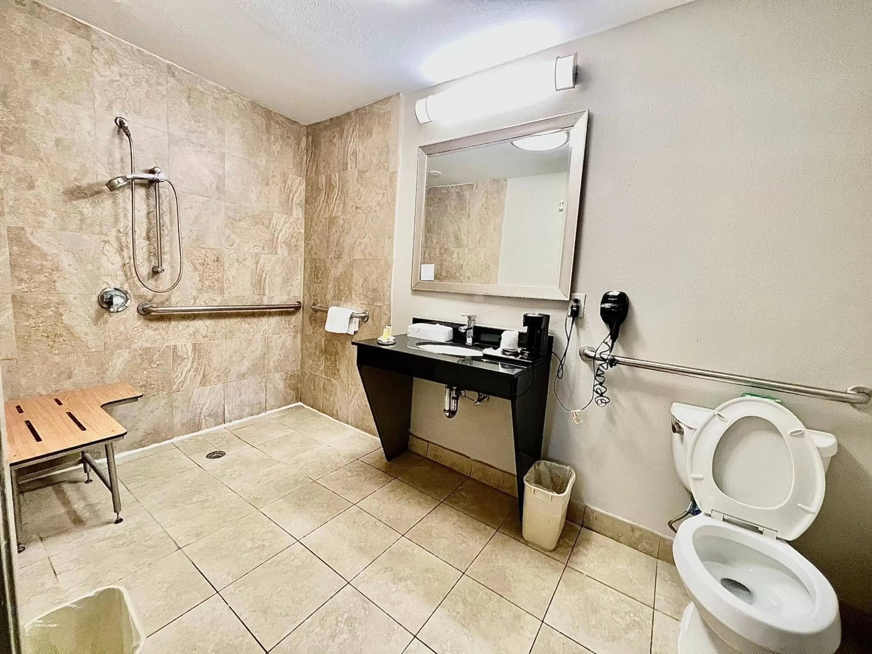 Toilet, Bathroom in Days Inn & Suites by Wyndham Arlington Near Six Flags