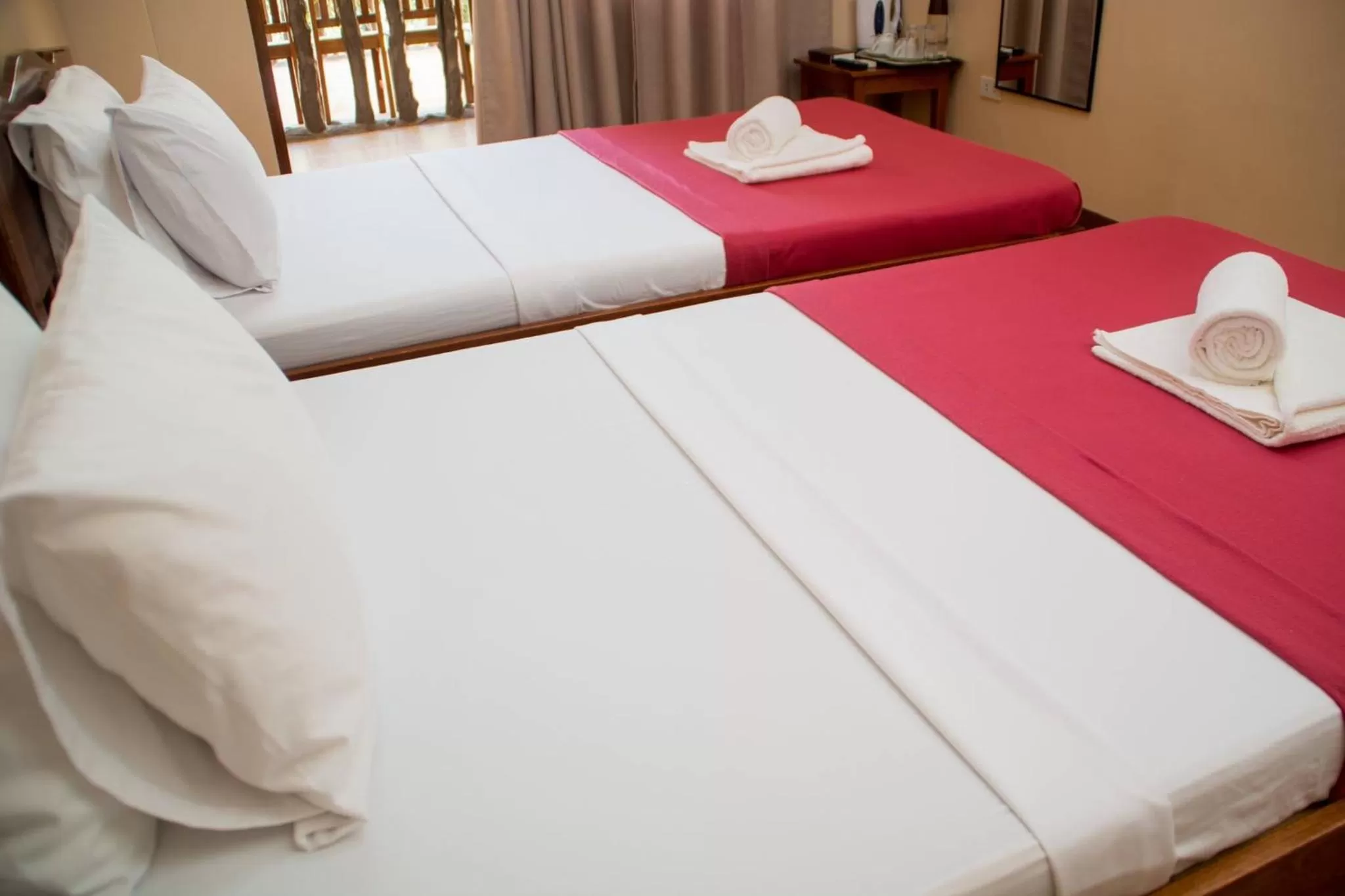 Bed in Jurias Garden Hotel