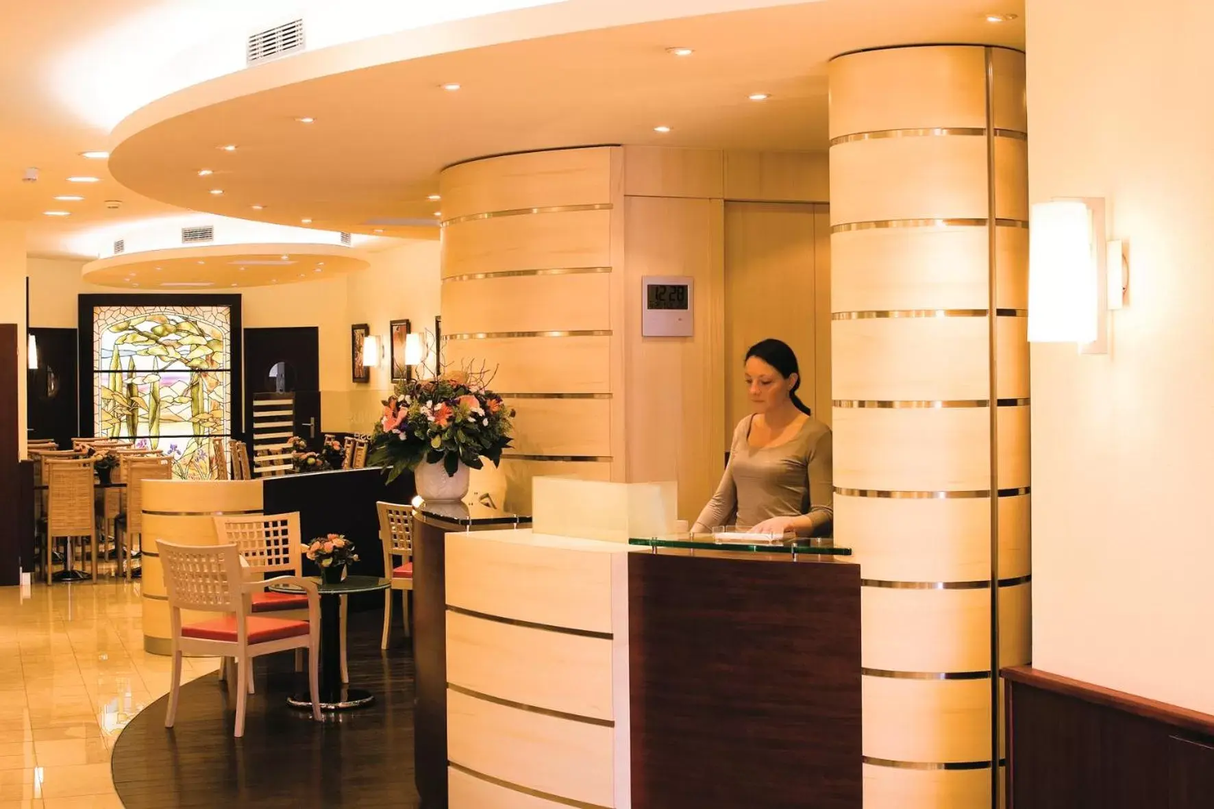 Lobby or reception in Hotel Terminus Montparnasse