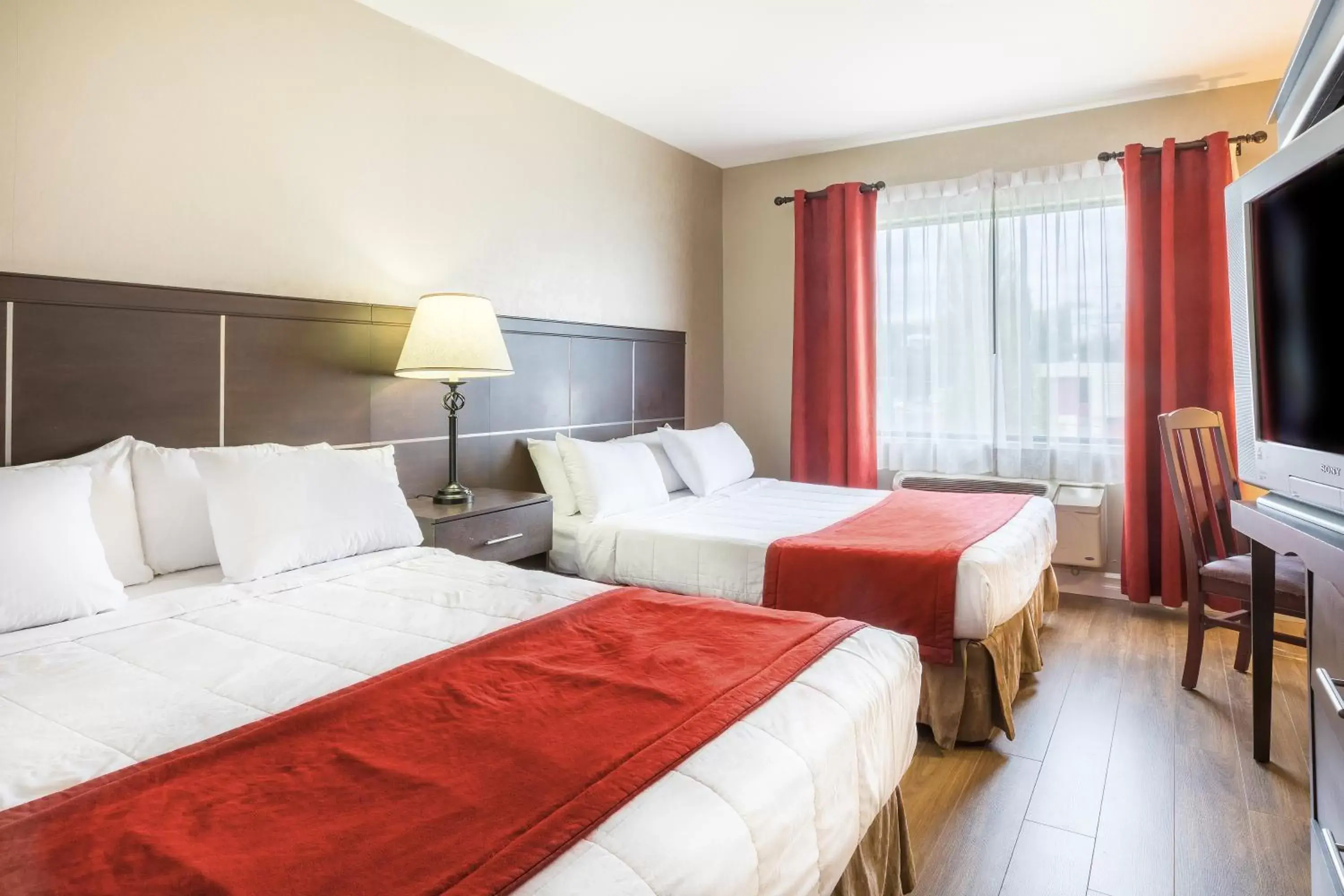 Economy Double Room with Two Double Beds in Hotel Ambassadeur et Suites Economy Double Room with Two Double Beds in Hotel Ambassadeur et Suites