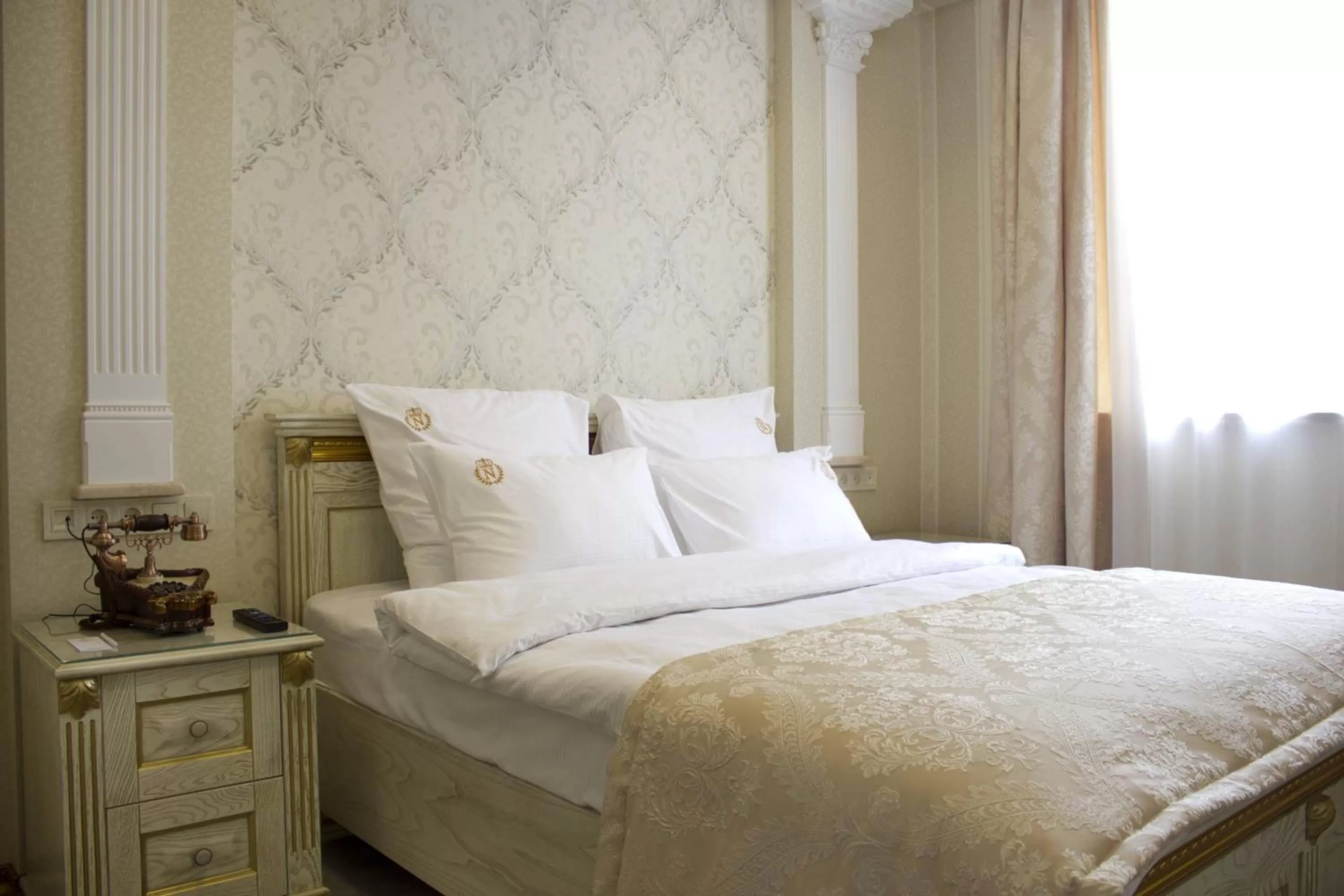 Bed in Neapol Boutique Hotel