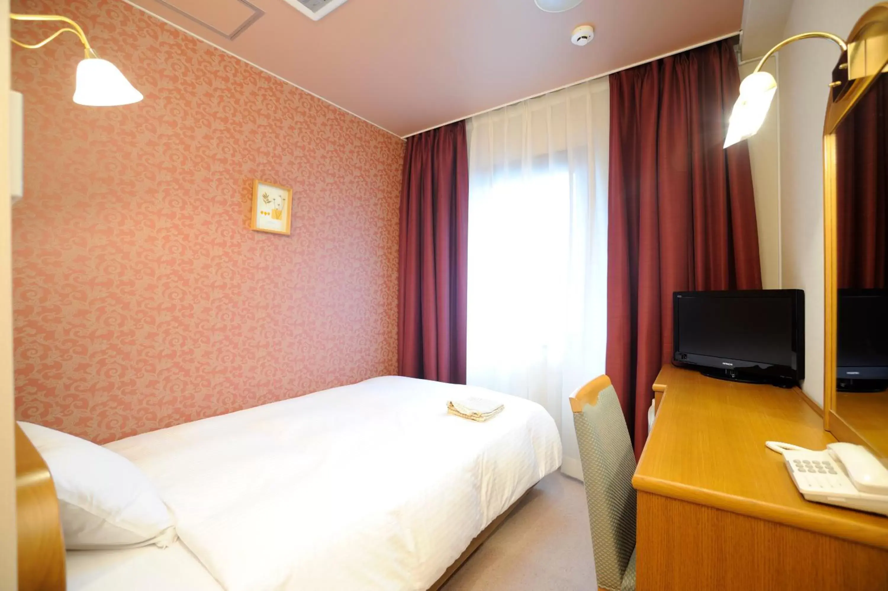 Photo of the whole room, Bed in Hotel Eclair Hakata