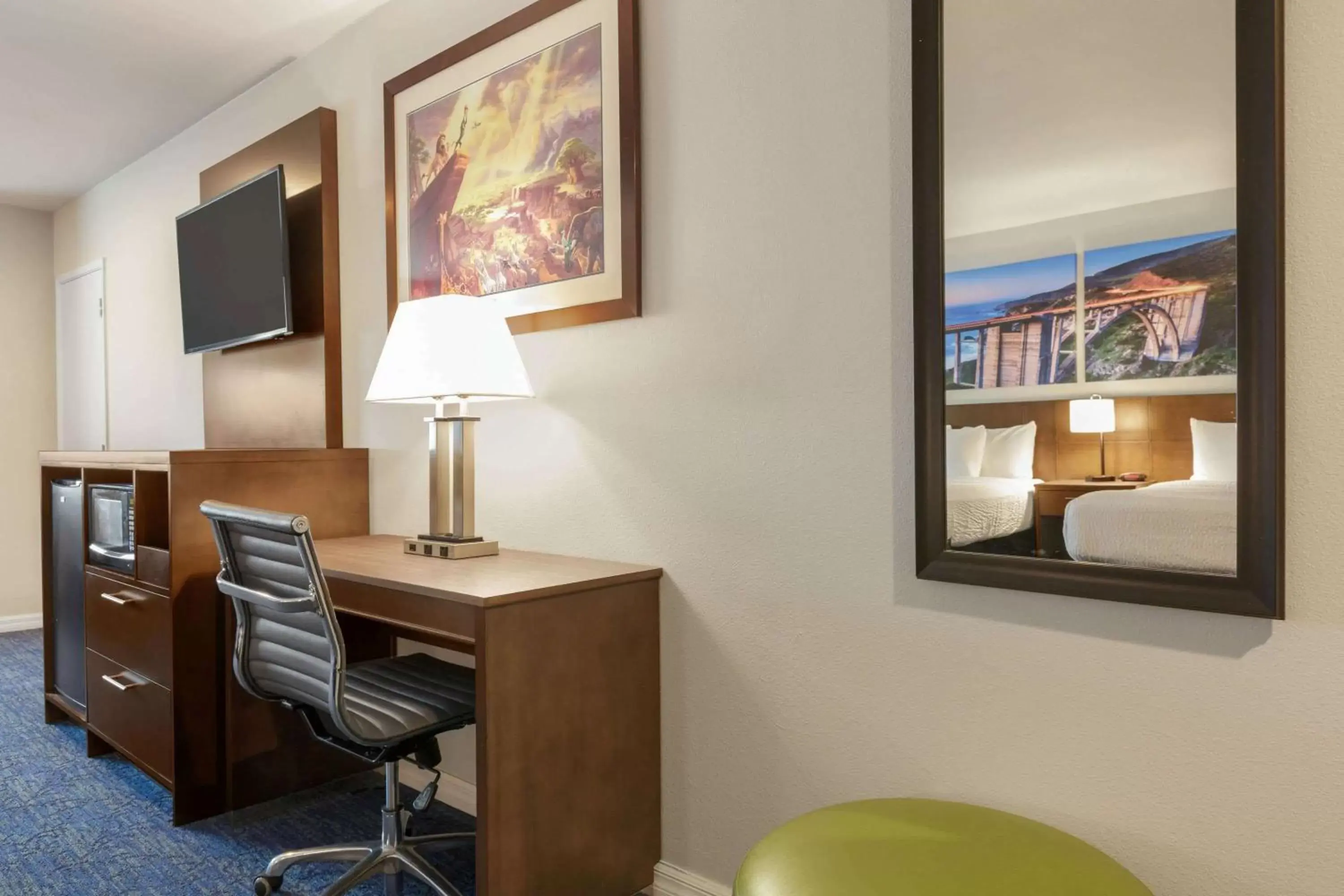 Bedroom, TV/Entertainment Center in Days Inn & Suites by Wyndham Anaheim At Disneyland Park