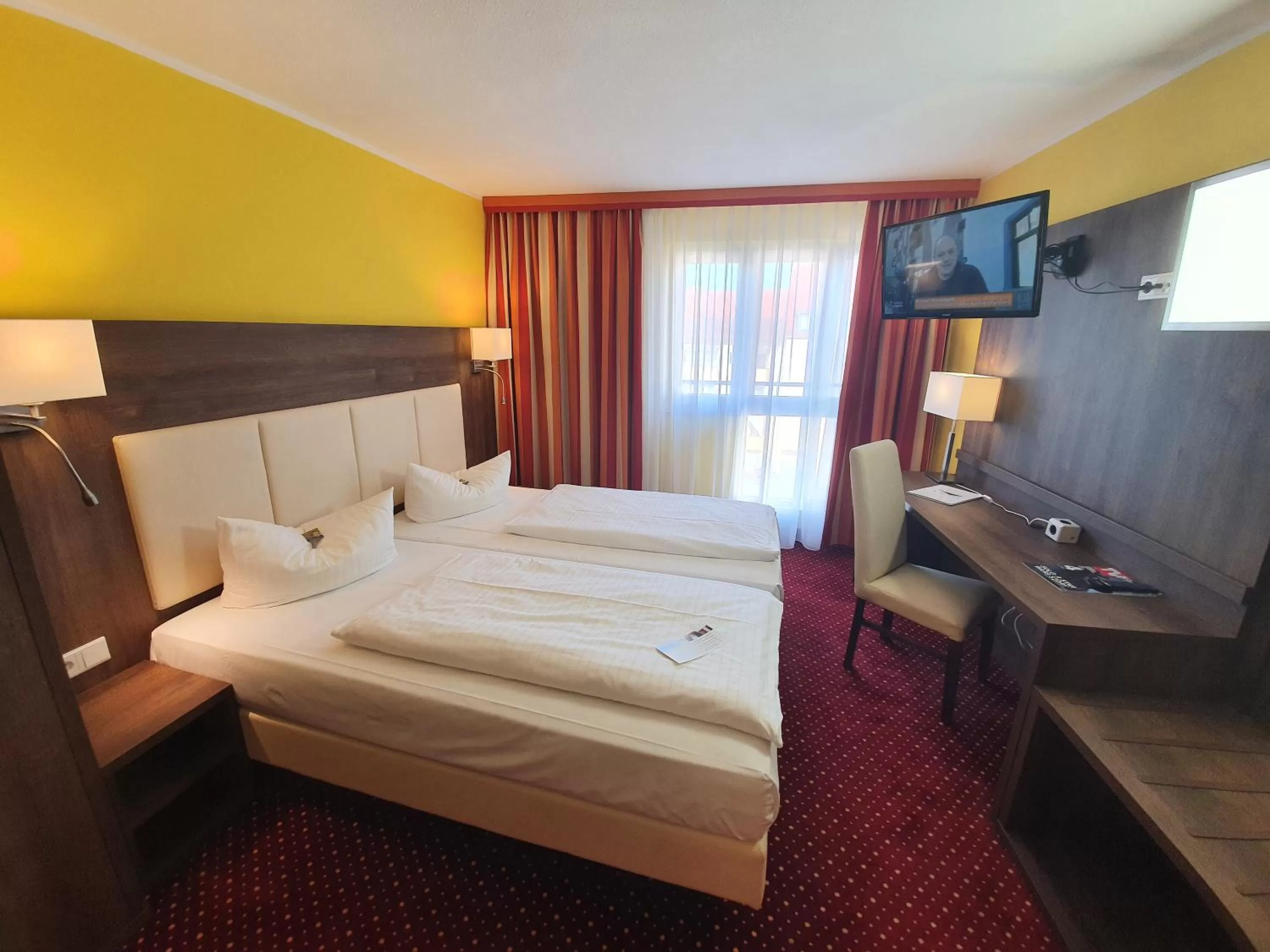 Photo of the whole room, Bed in INVITE Hotel Nürnberg City