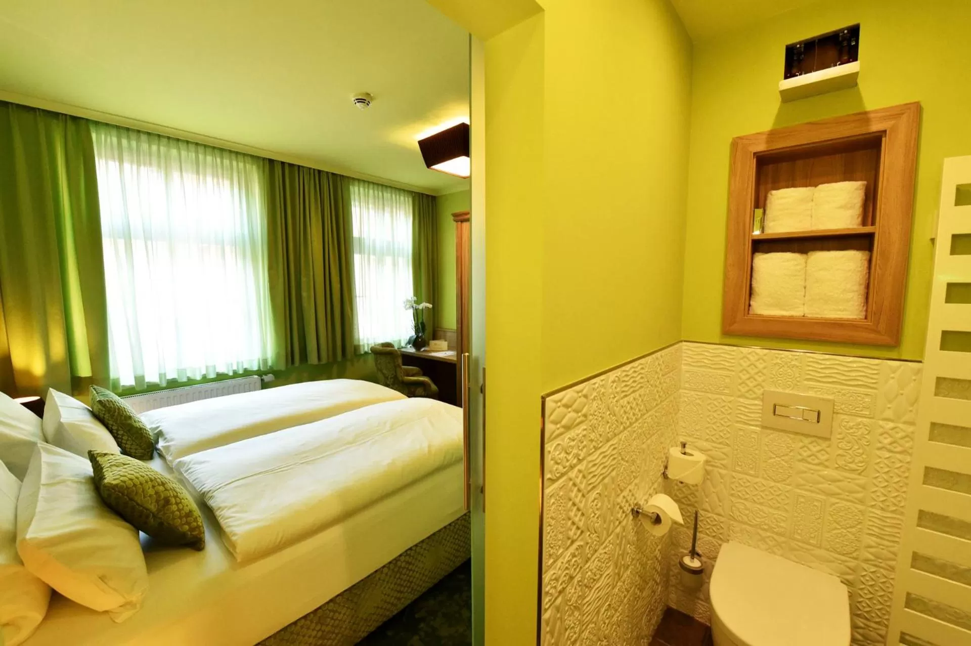 Decorative detail, Bed in MOMENTS Boutique Hotel