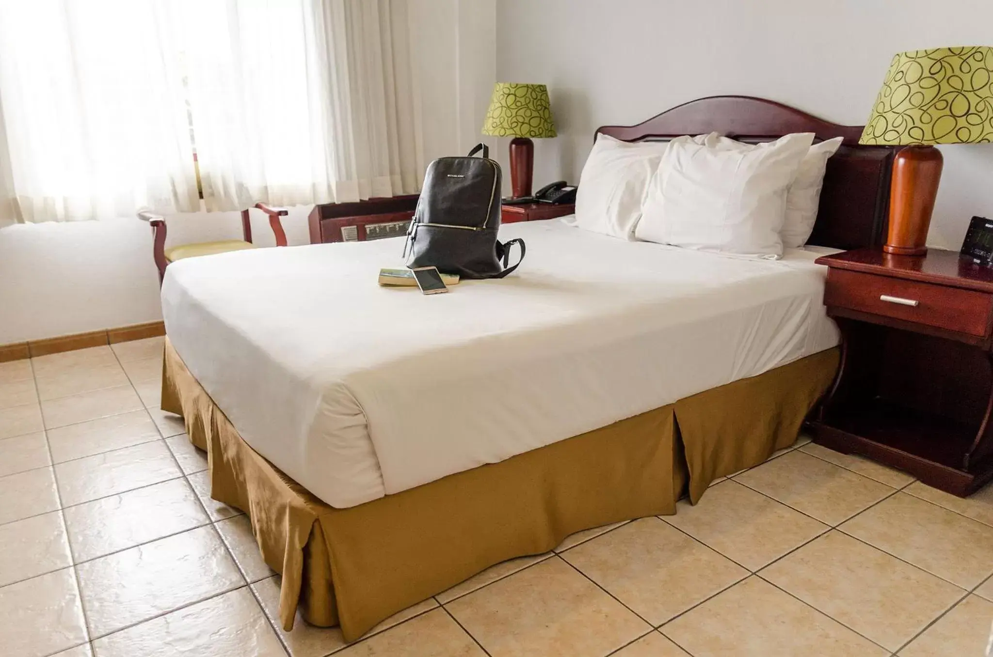 Bedroom, Bed in La Sabana Hotel Suites Apartments