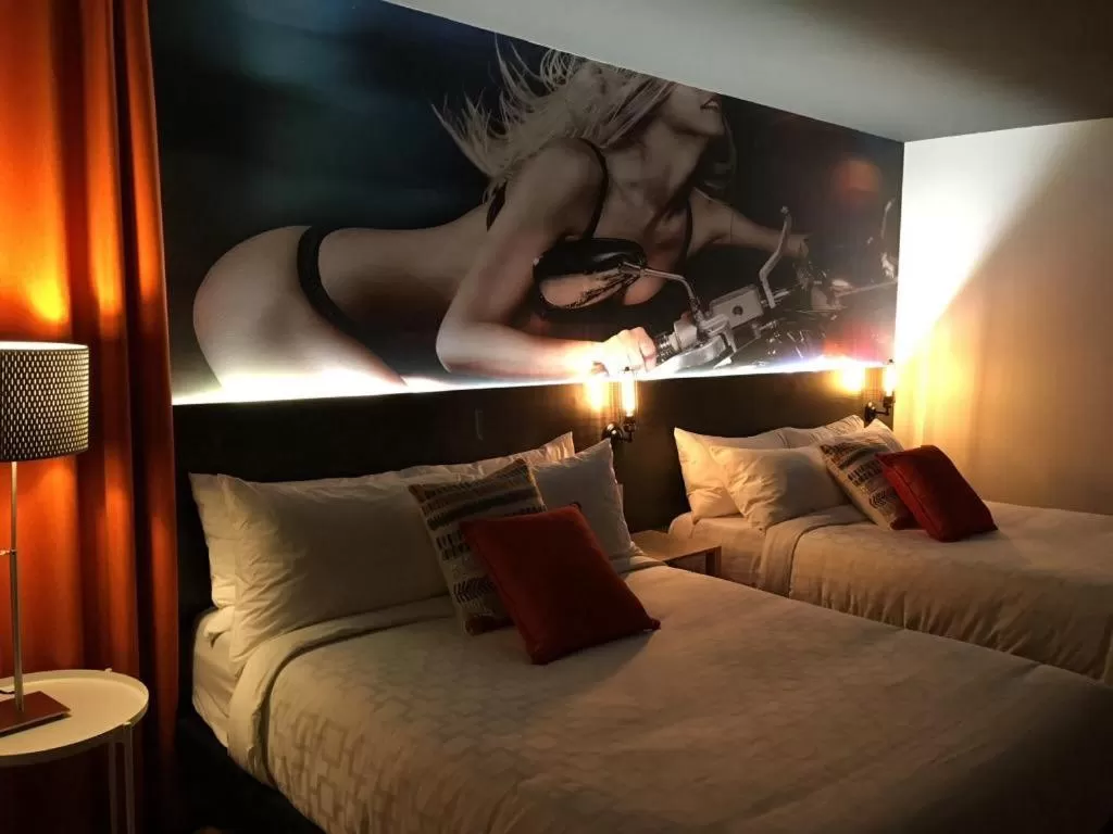 Bed in Hotel Historique et Manoir Route 66