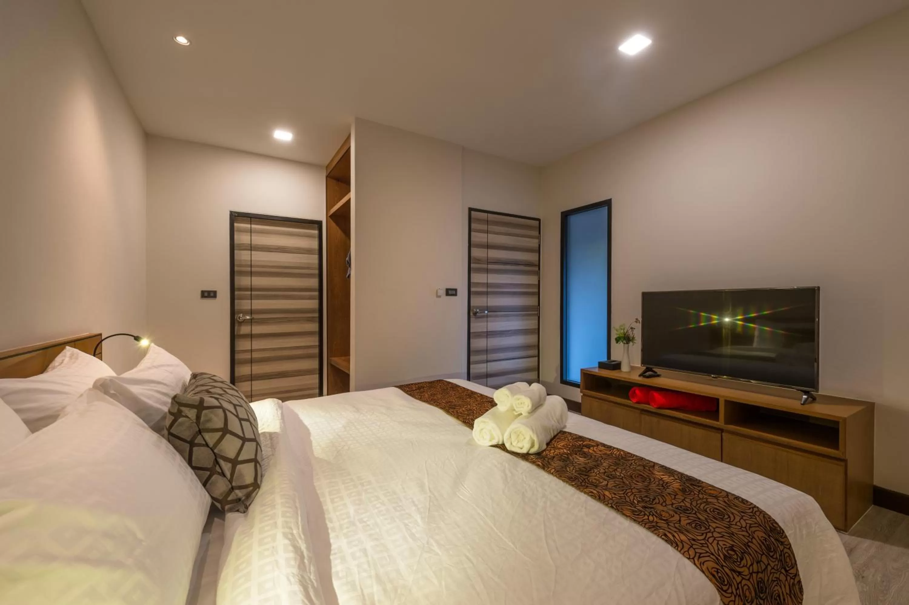 Bed in Cher​mantra​ Aonang​ Resort & Pool​ Suite
