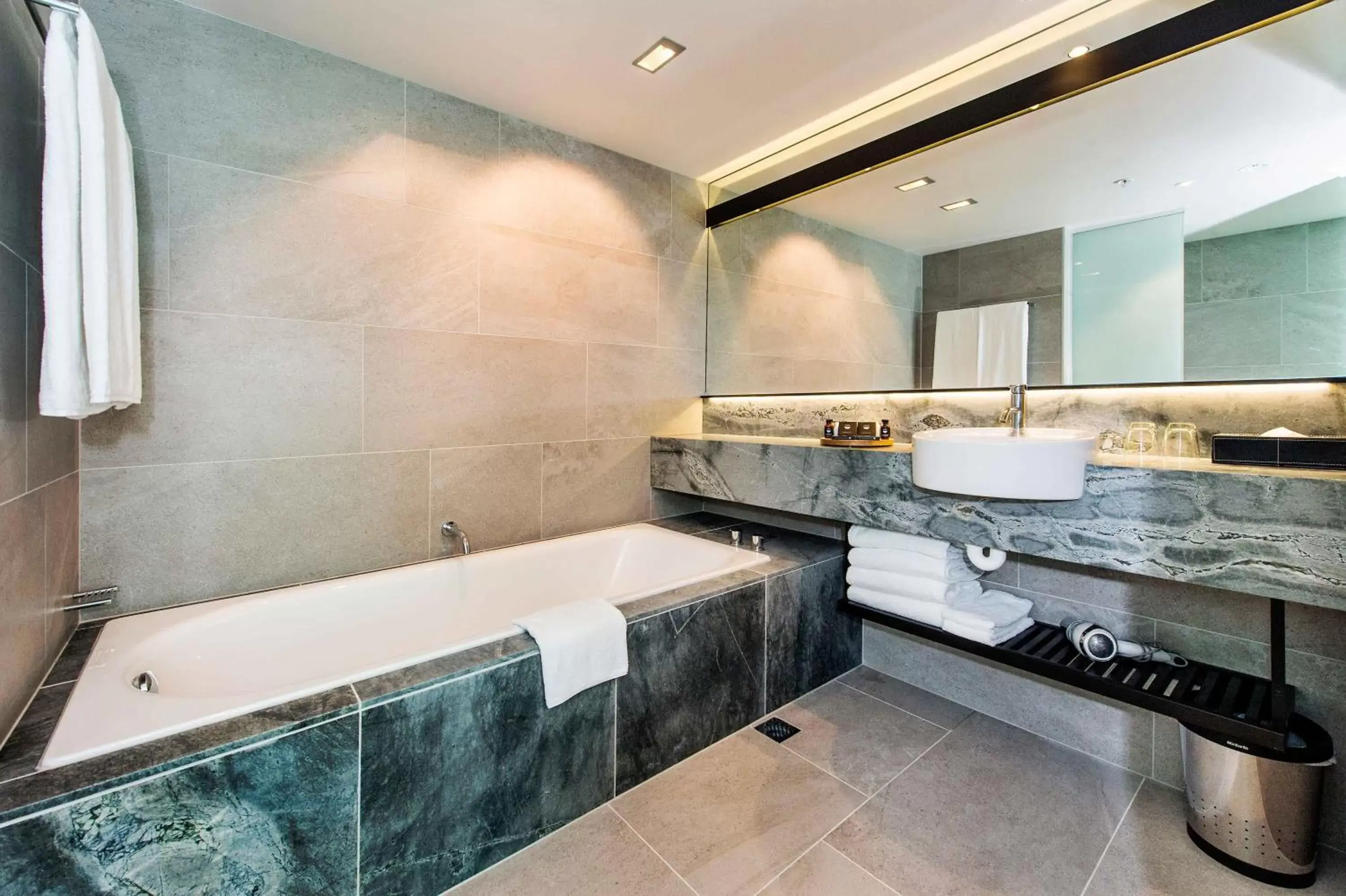 Bathroom in The Grand by SkyCity