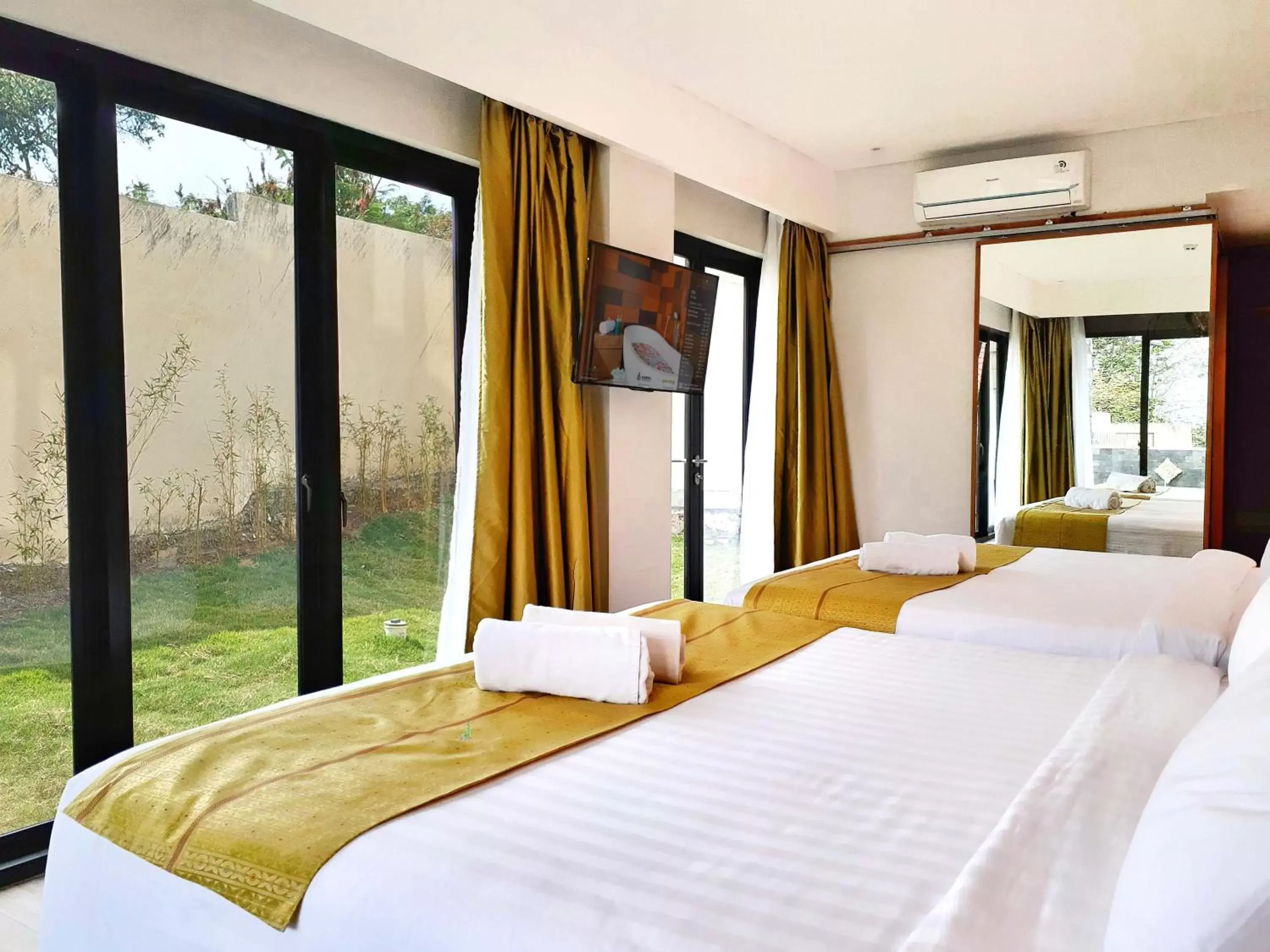 Bed in The Batu Hotel & Villas
