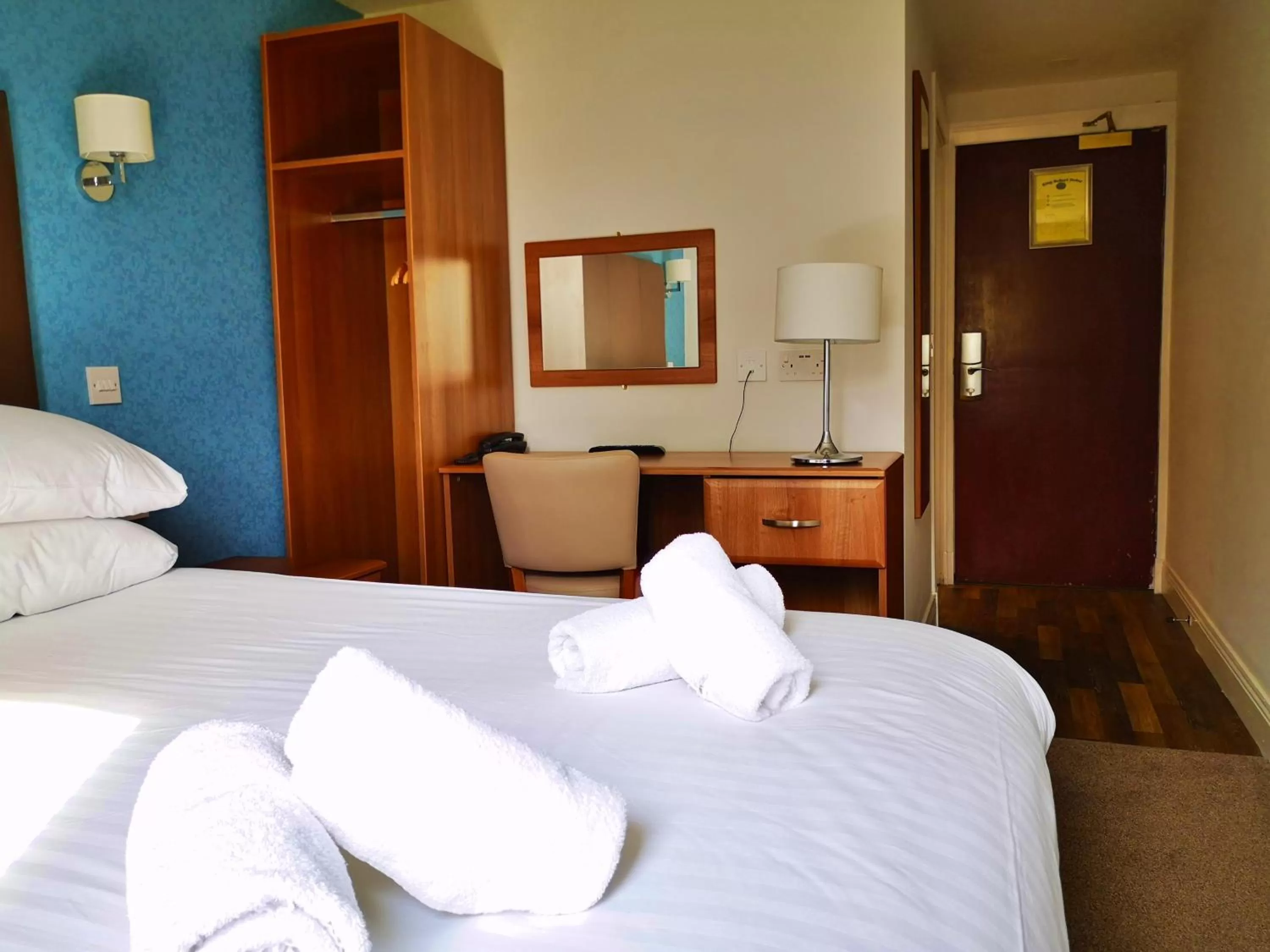 Bed in King Robert Hotel