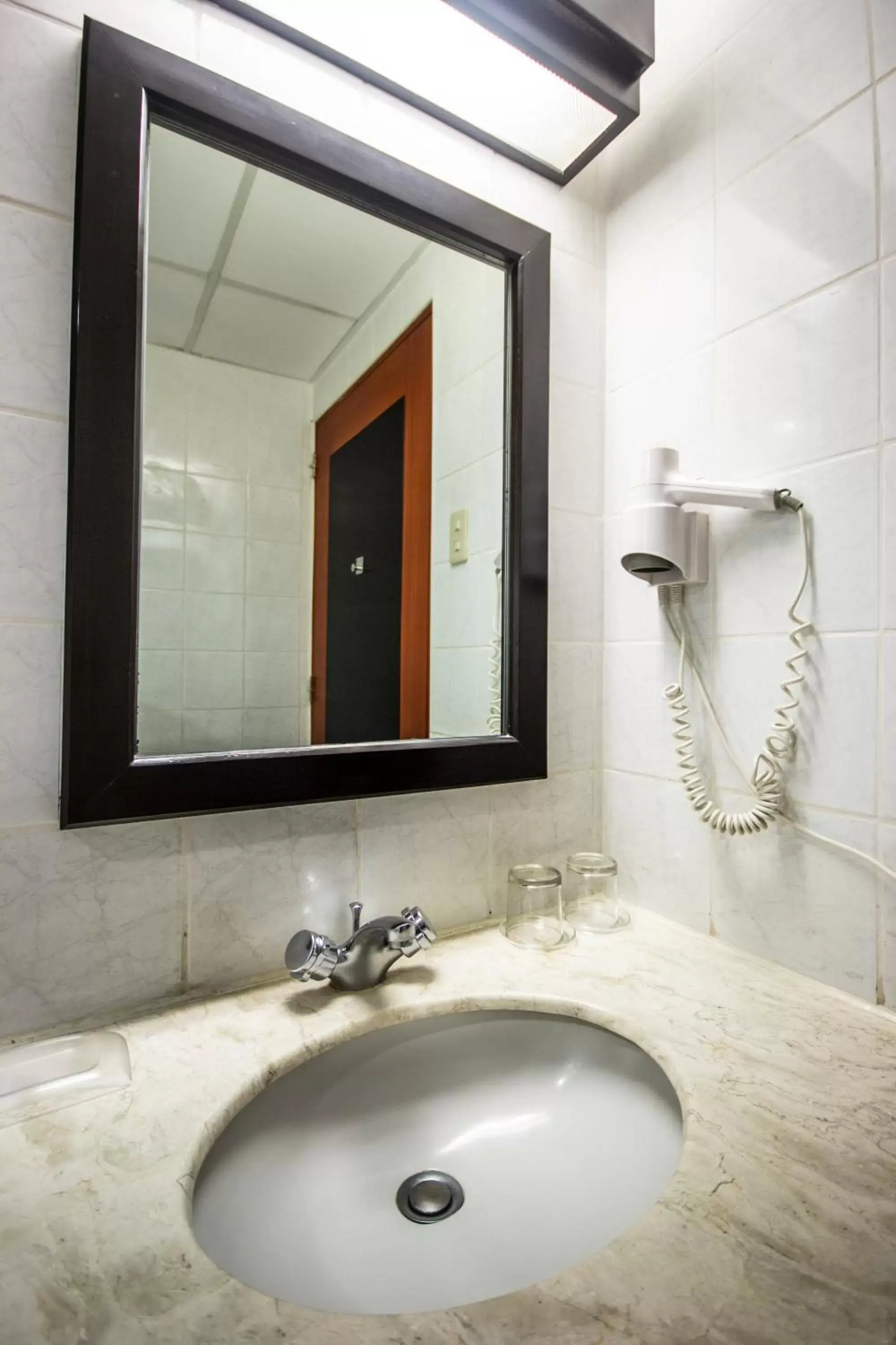 Bathroom in Microtel by Wyndham Batangas