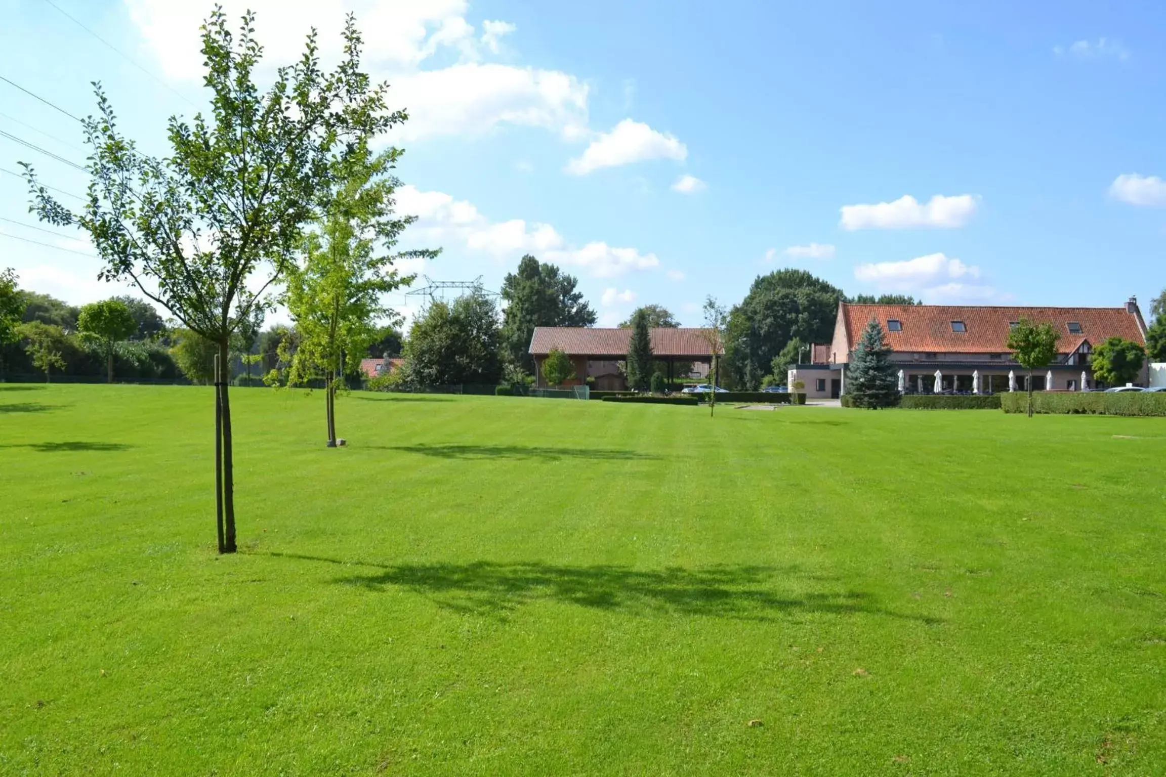 Garden view, Property Building in Le Domaine des Cigognes