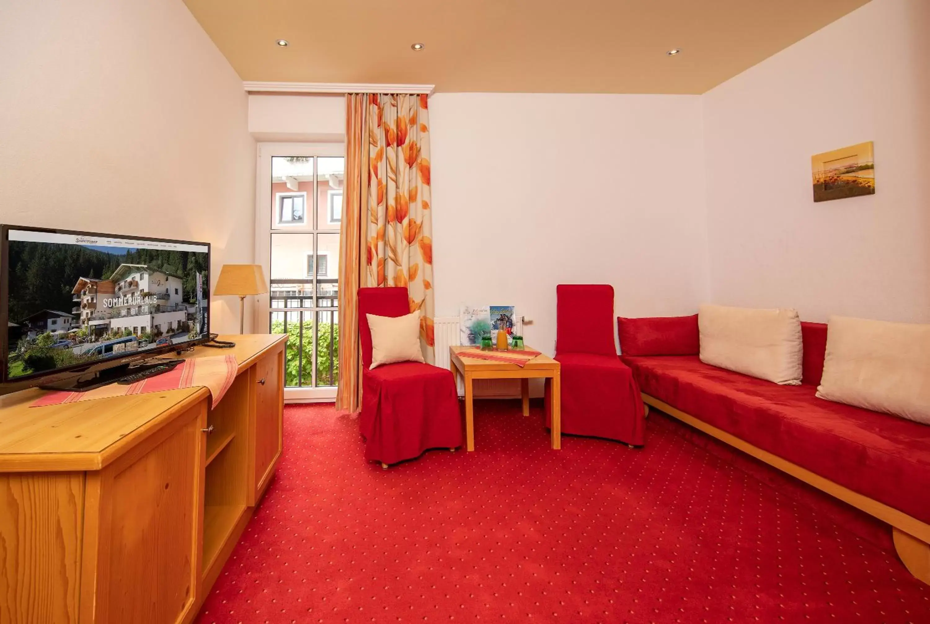 Living room, TV/Entertainment Center in Hotel Der Schmittenhof